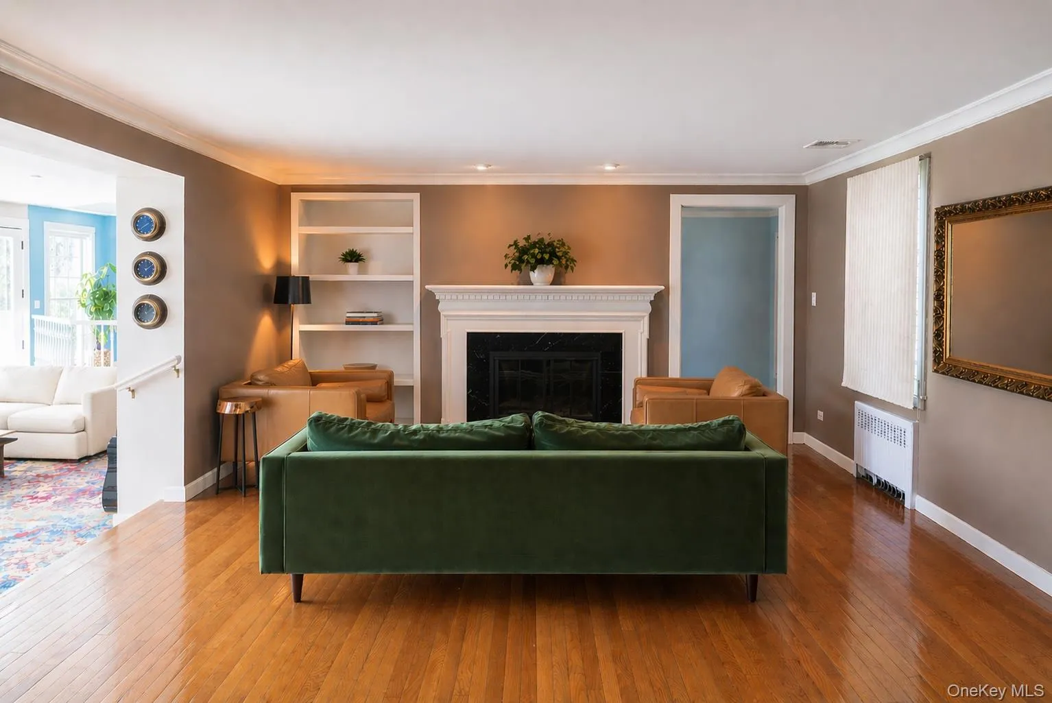 Cozy formal living room with wood burning fireplace. Cozy formal living room with wood burning fireplace.