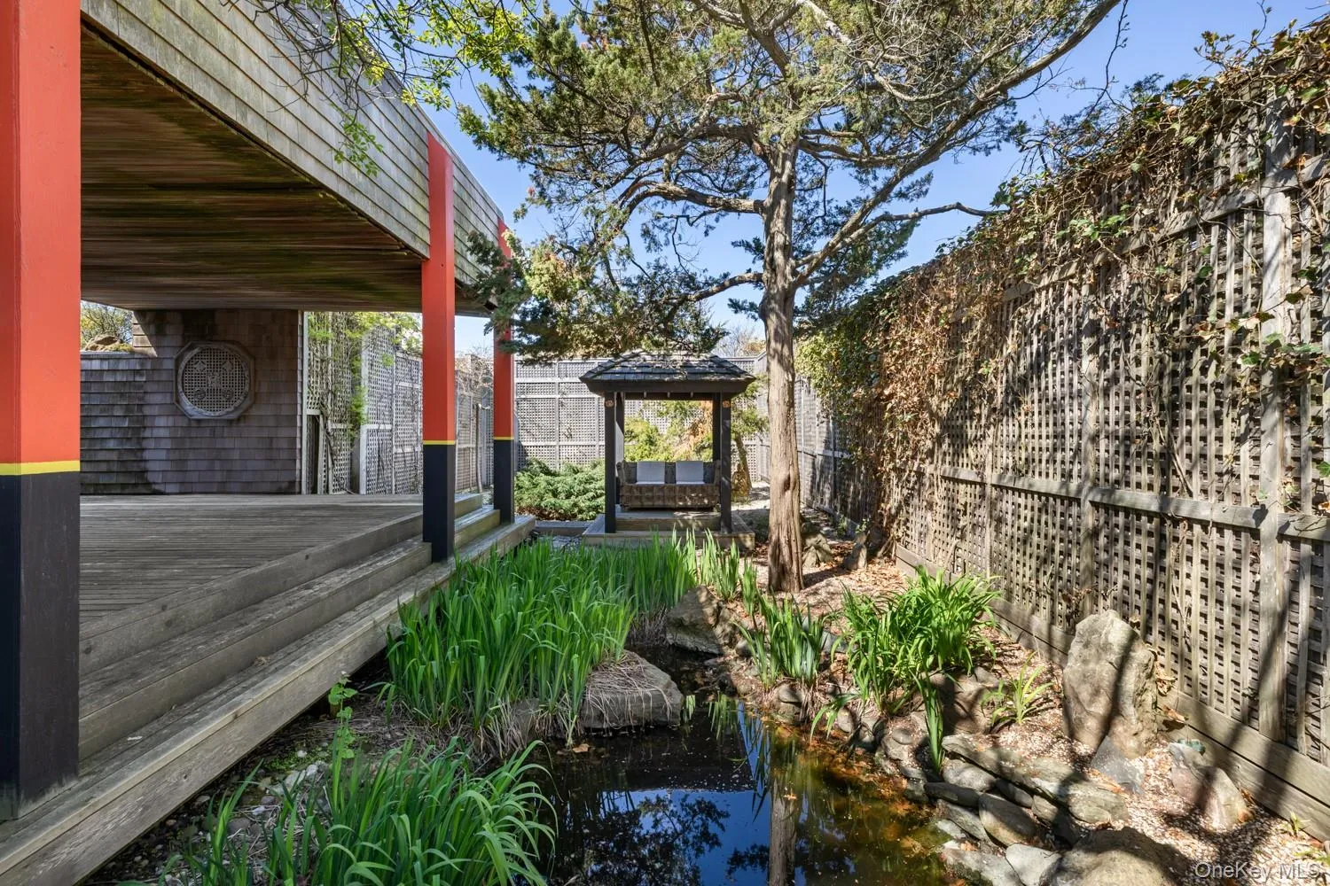 Pond within Garden Area facing Seating Area Pond within Garden Area facing Seating Area