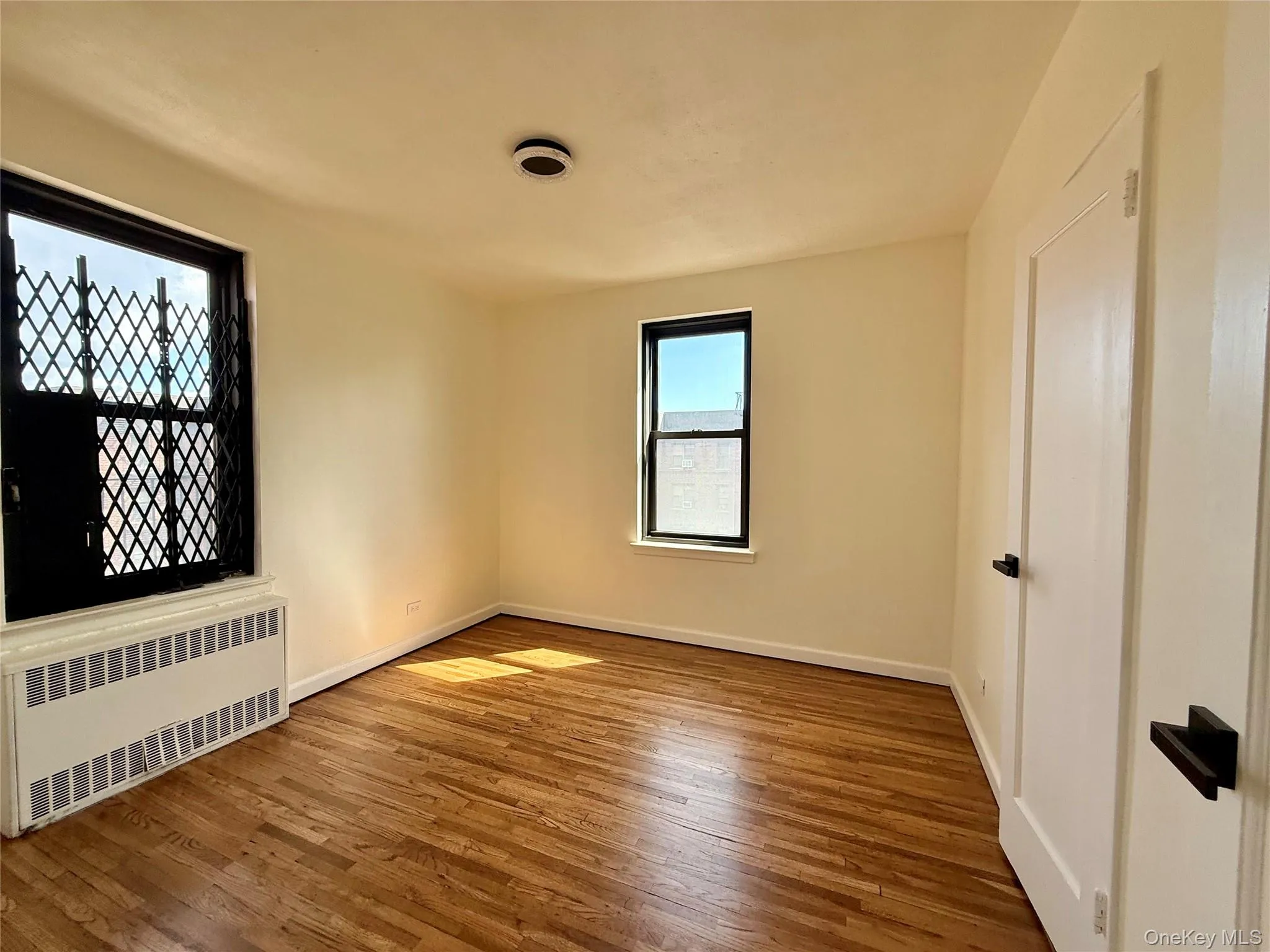 Second bedroom also a corner bedroom, 2 opposite side window, a large closet, ceiling lights and hardwood flooring. Second bedroom also a corner bedroom, 2 opposite side window, a large closet, ceiling lights and hardwood flooring.