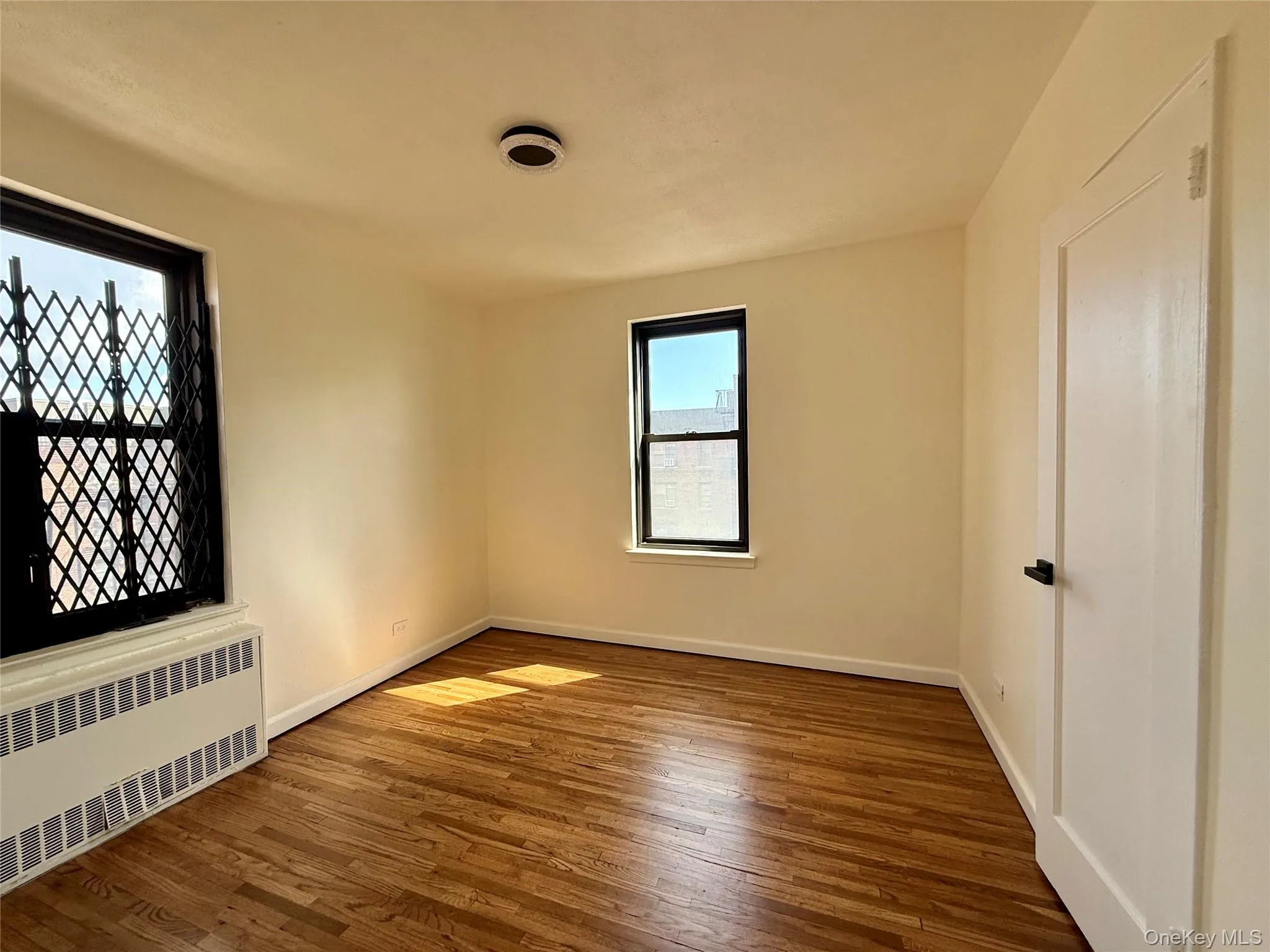 Second bedroom also a corner bedroom, 2 opposite side window, a large closet, ceiling lights and hardwood flooring. Second bedroom also a corner bedroom, 2 opposite side window, a large closet, ceiling lights and hardwood flooring.