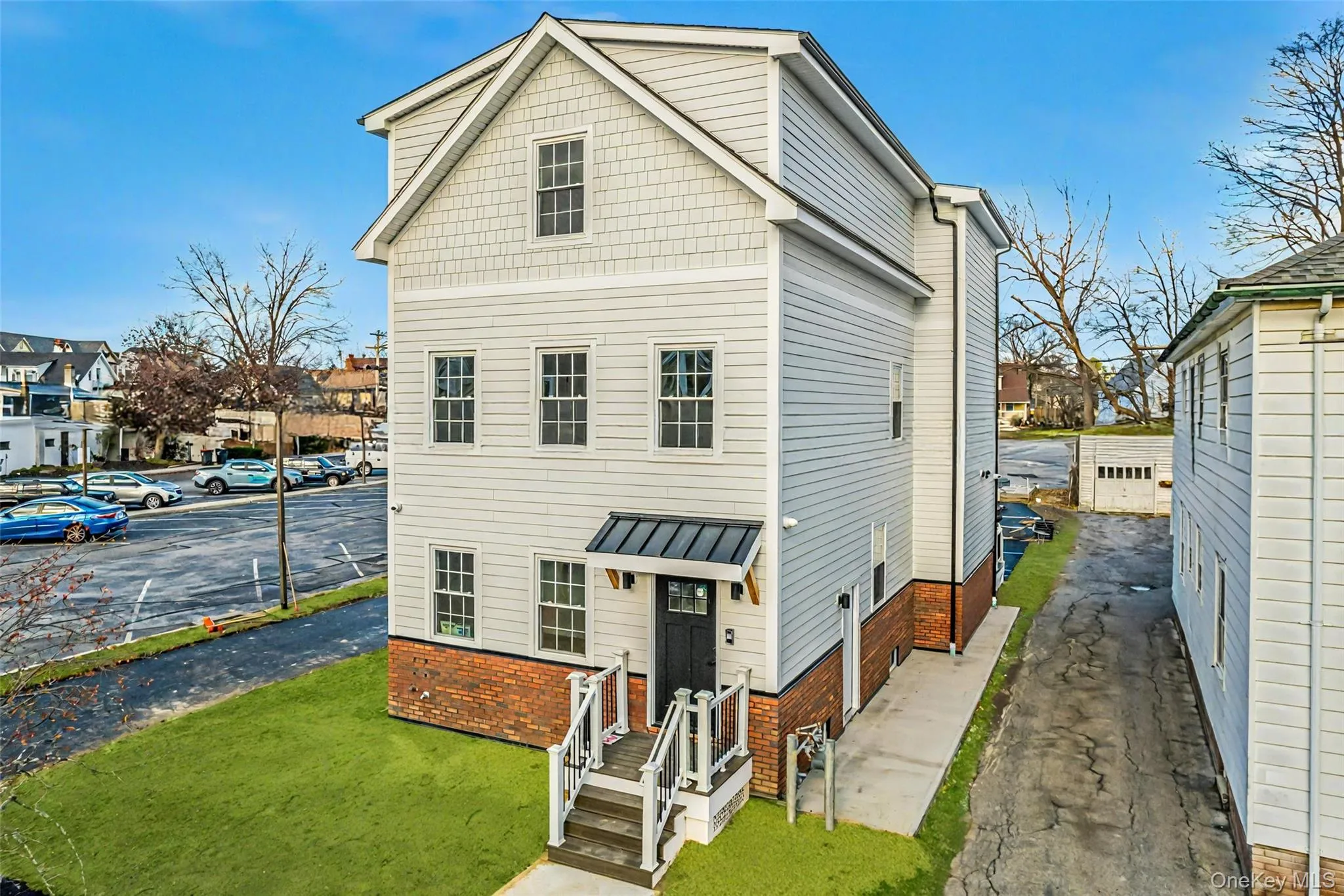 View of front facade featuring a front yard View of front facade featuring a front yard