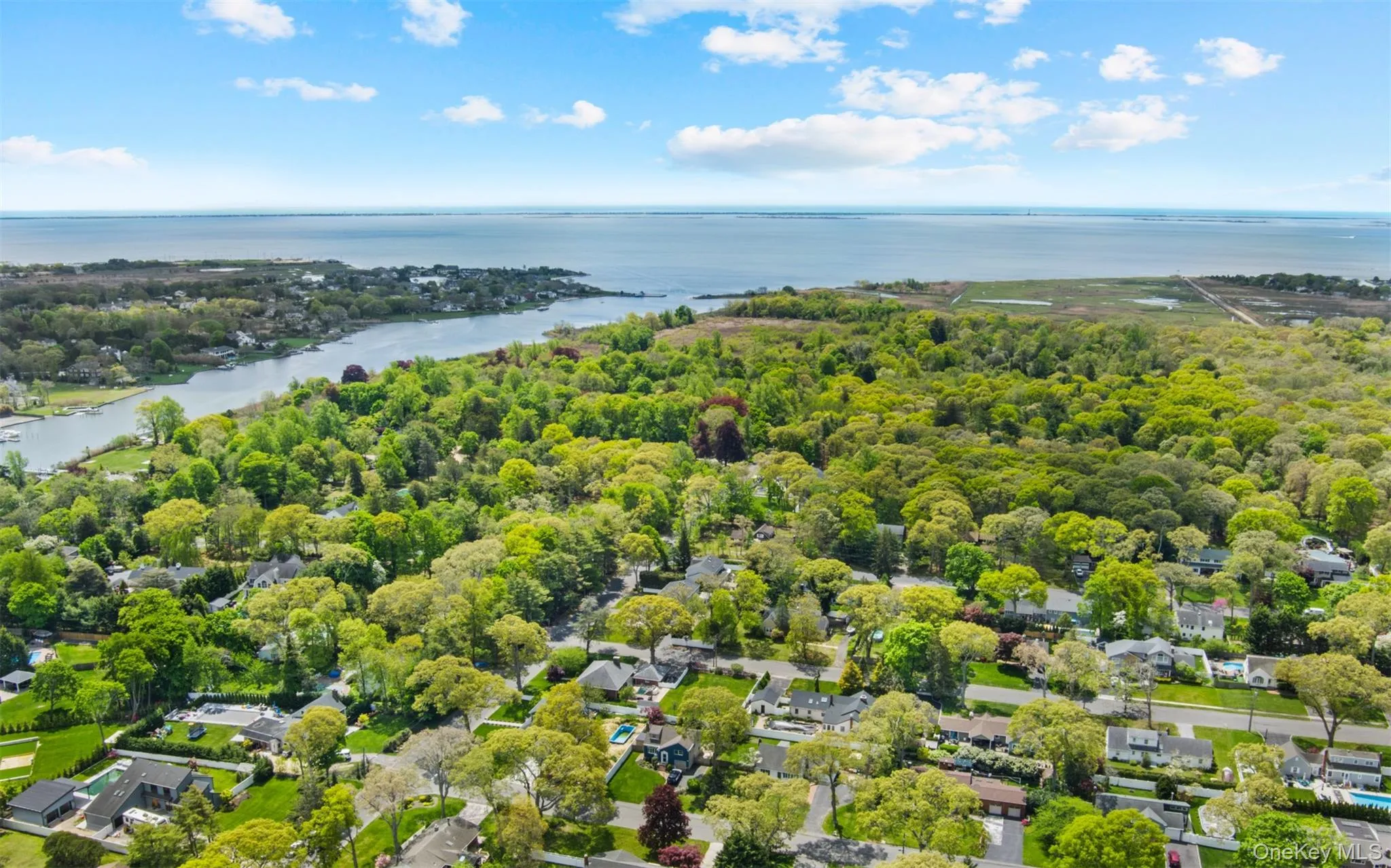 Aerial perspective showcasing Islip town beach and Great South Bay Aerial perspective showcasing Islip town beach and Great South Bay