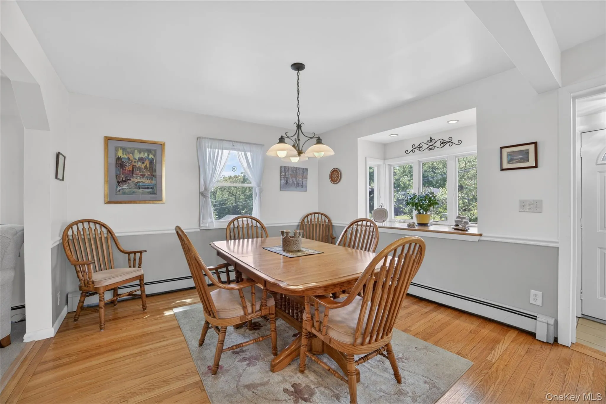 The garden window enhances the beauty of this spacious dining room, can fit a table for 8 or more. The garden window enhances the beauty of this spacious dining room, can fit a table for 8 or more.