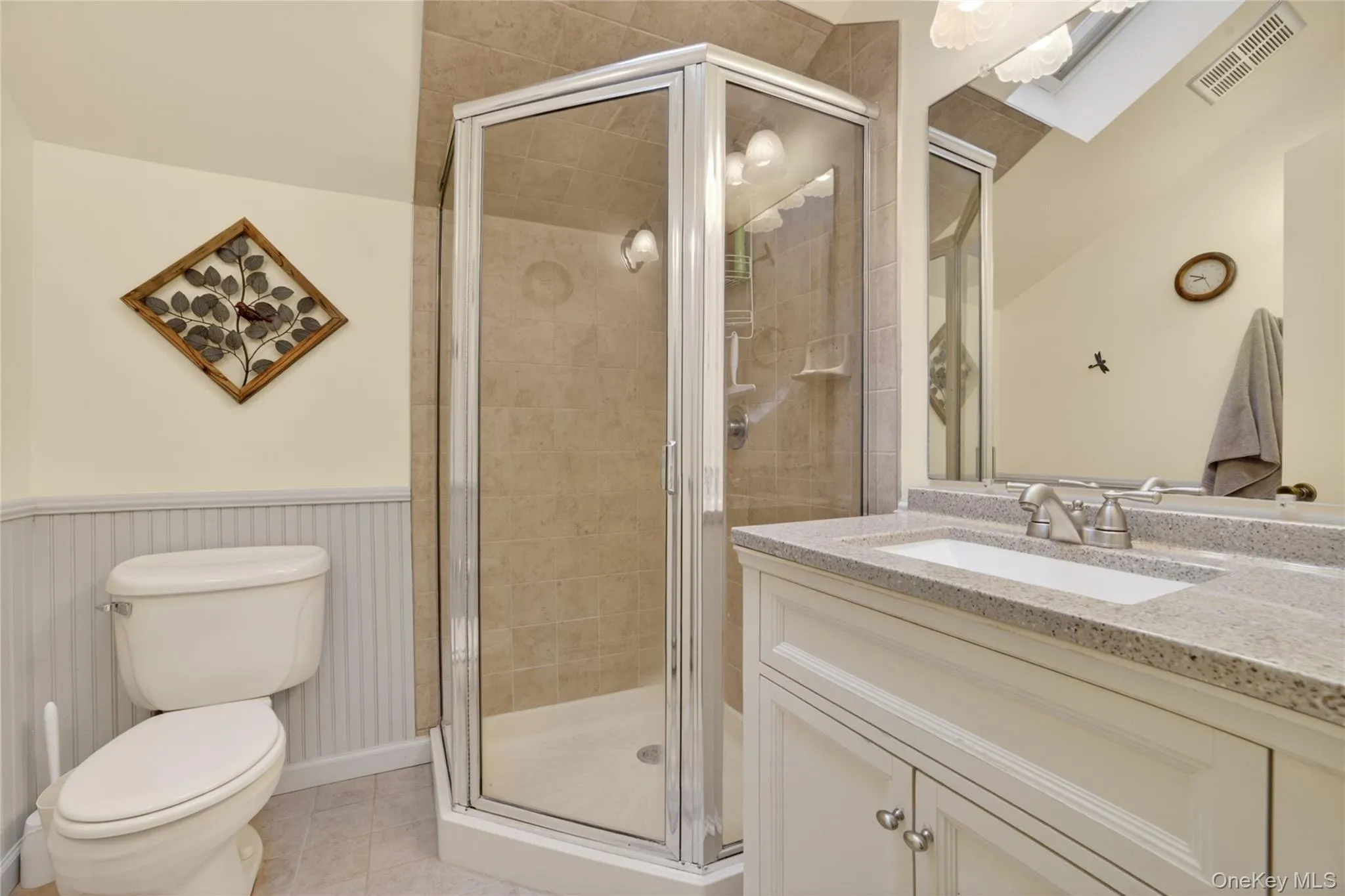 Upstairs hall bath features neutral color scheme and updated fixtures. Upstairs hall bath features neutral color scheme and updated fixtures.