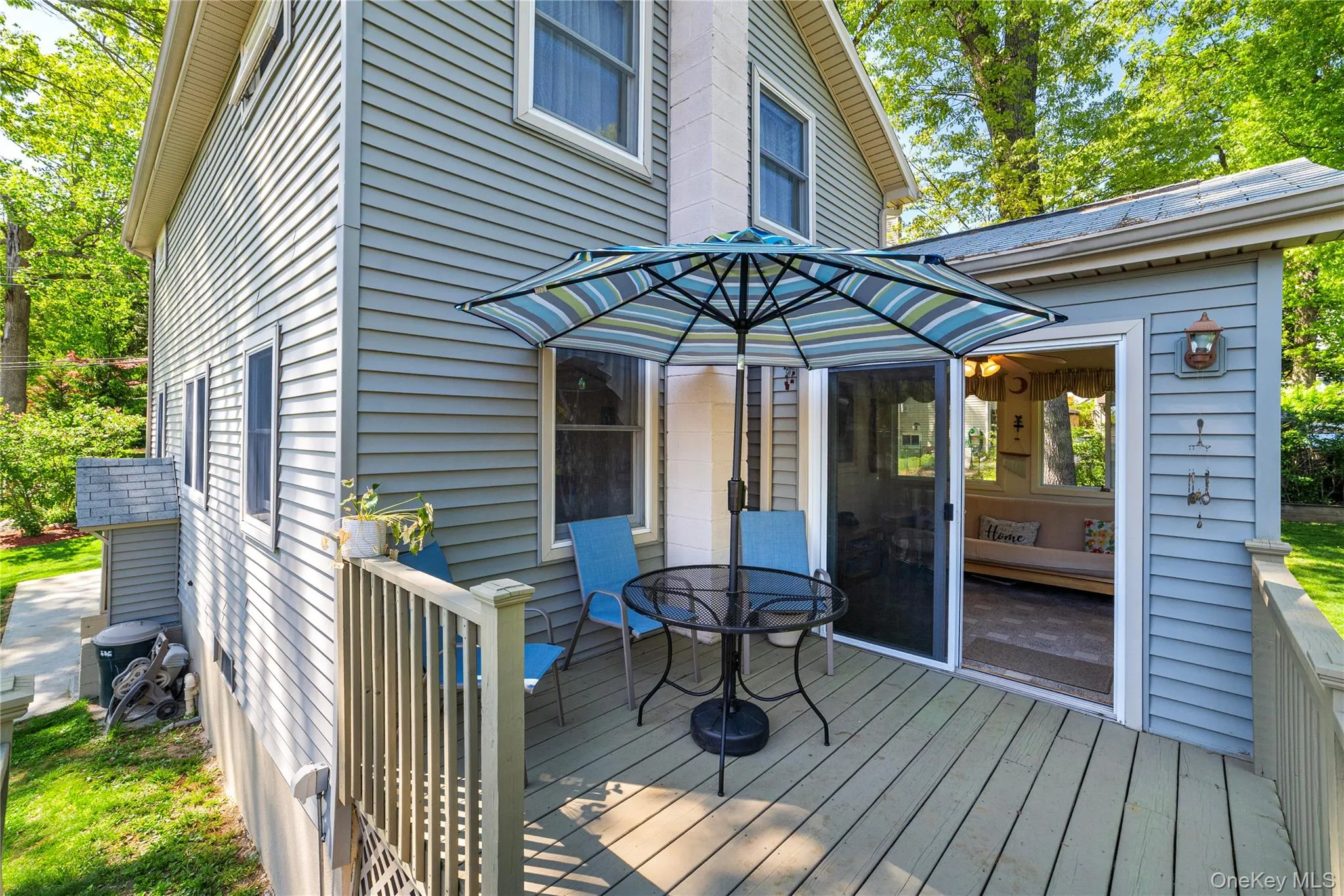 The exterior takes you from the four season room to this deck with plenty of space for table, chairs and bbq. The exterior takes you from the four season room to this deck with plenty of space for table, chairs and bbq.