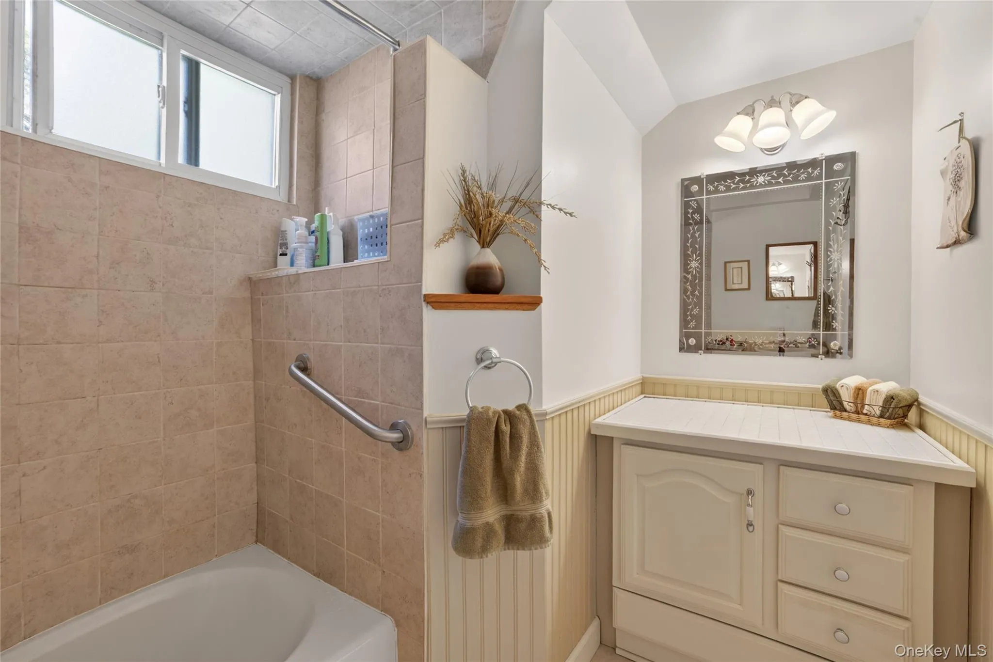 A bonus vanity opposite the pedestal sink for so much added storage. A bonus vanity opposite the pedestal sink for so much added storage.
