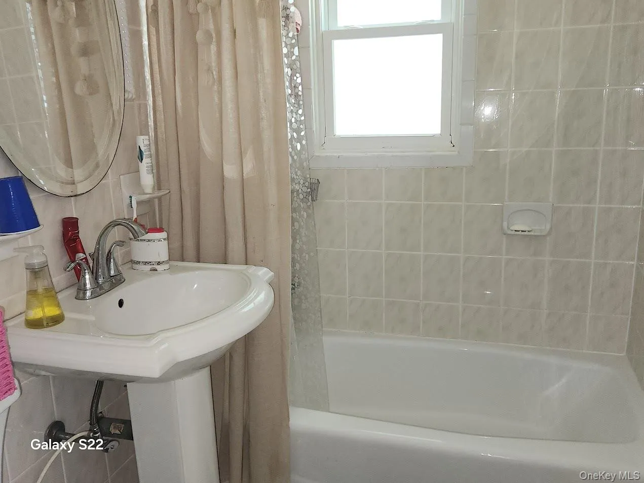 Full bath with shower / tub combo Full bath with shower / tub combo