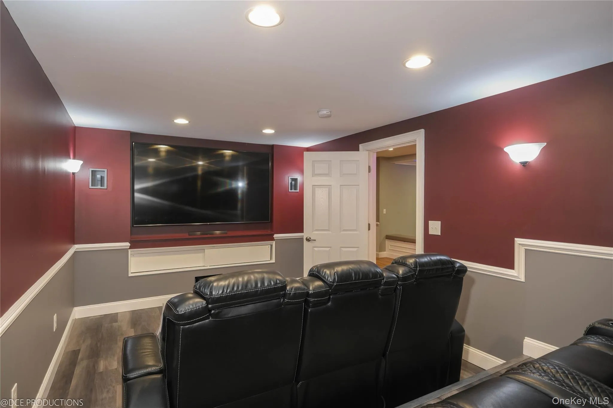 Cinema room with recessed lighting, and accent trim - seating for 9. Cinema room with recessed lighting, and accent trim - seating for 9.