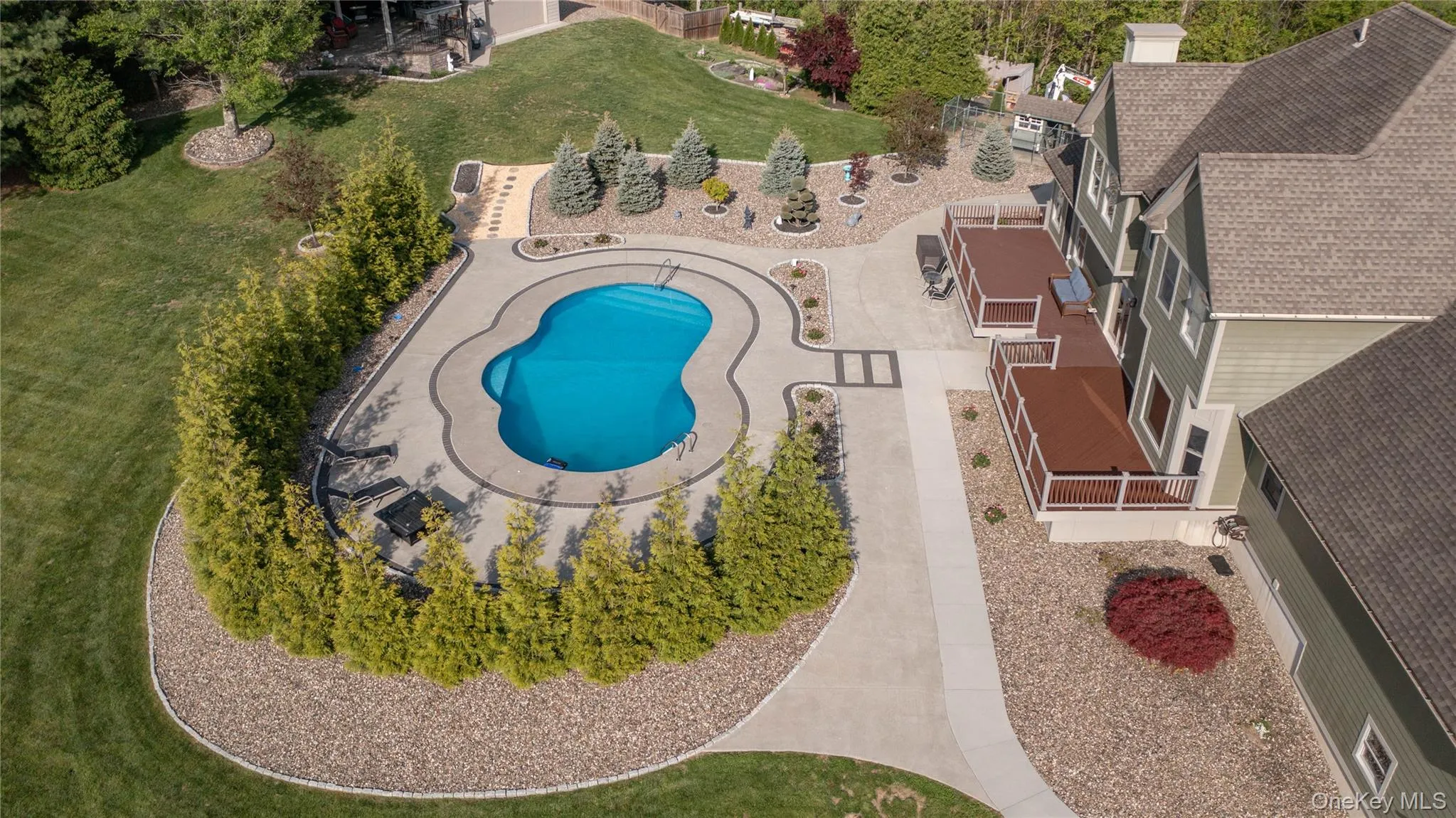 Bird's eye view of private pool complex. Bird's eye view of private pool complex.