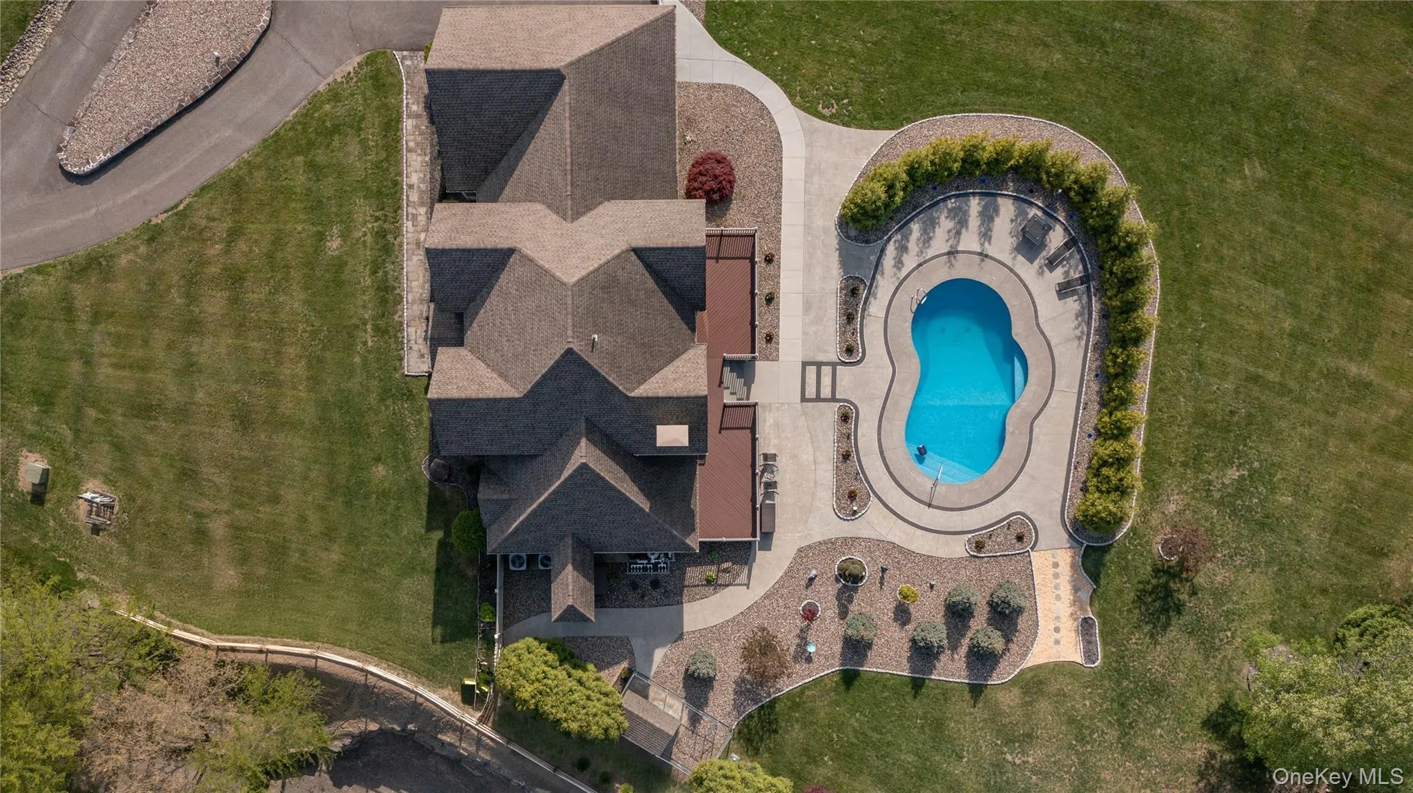 Aerial view of a pool area Aerial view of a pool area