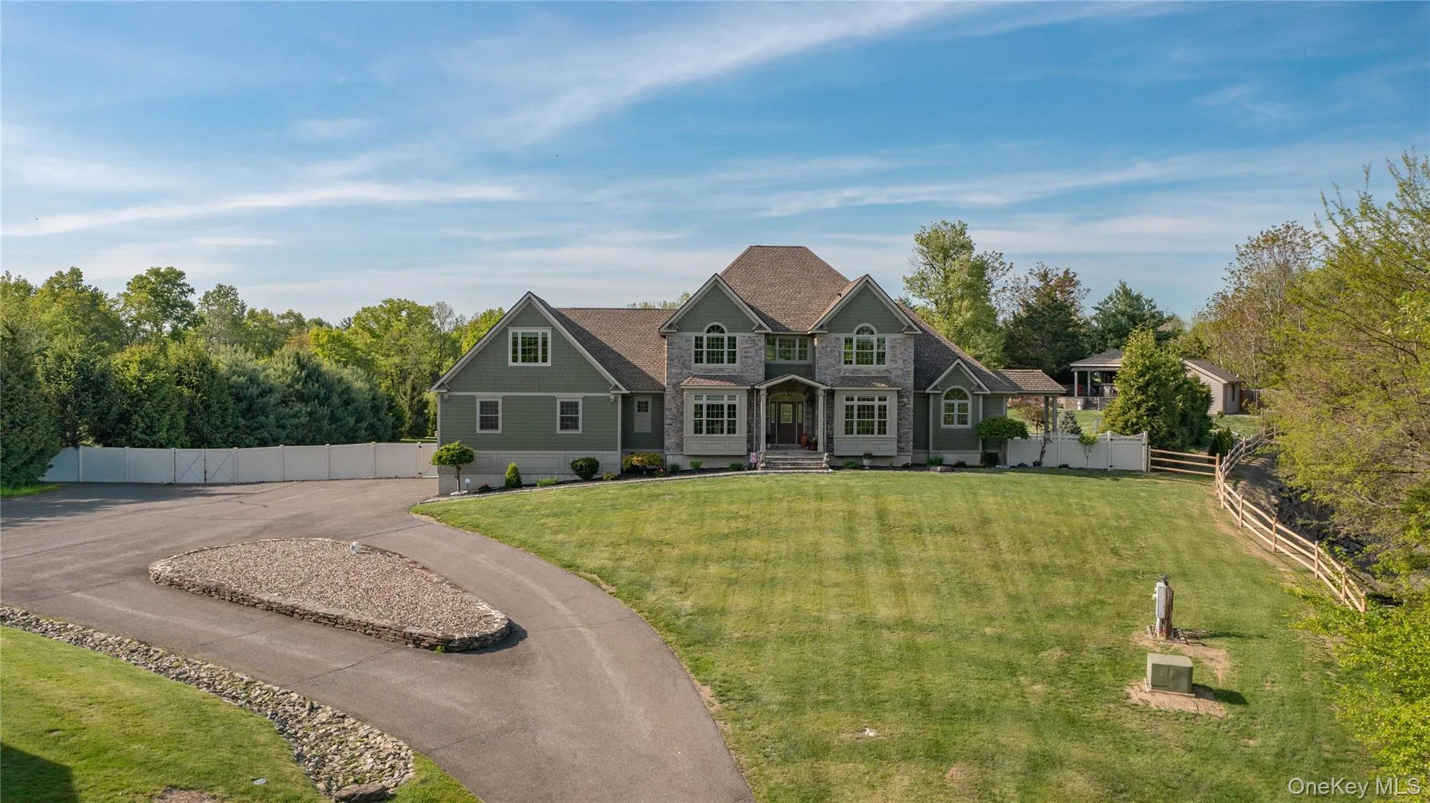 Set high and well set back off the road - the house, guest house, pool and grounds are in impeccable condition. Set high and well set back off the road - the house, guest house, pool and grounds are in impeccable condition.
