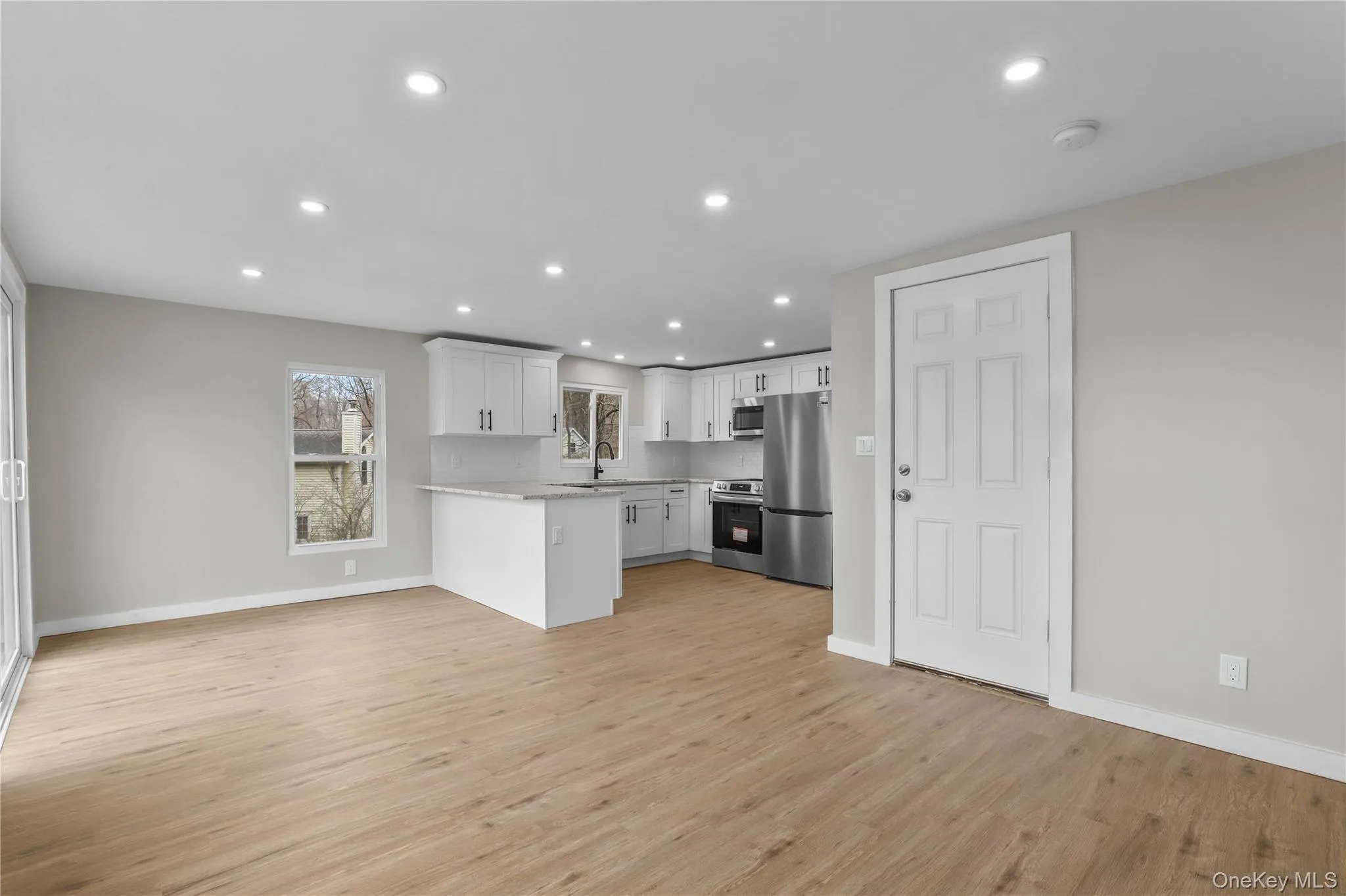 Open Concept Living Room and Dining Area Open Concept Living Room and Dining Area