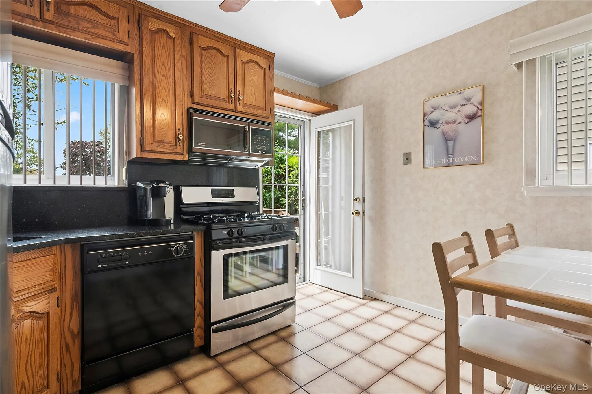 Eat in kitchen with door to back deck Eat in kitchen with door to back deck