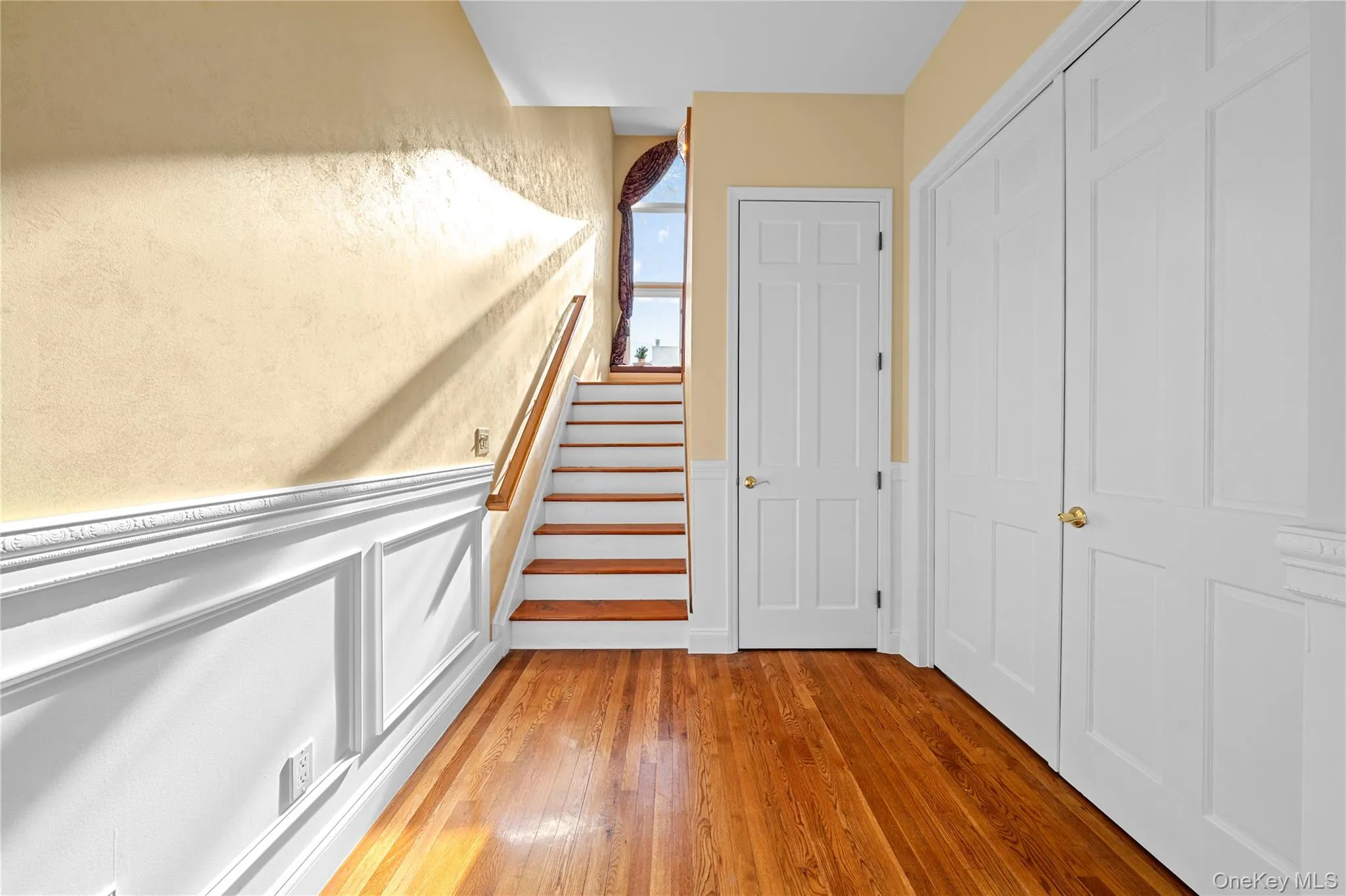 stairs to second floor with sitting area stairs to second floor with sitting area