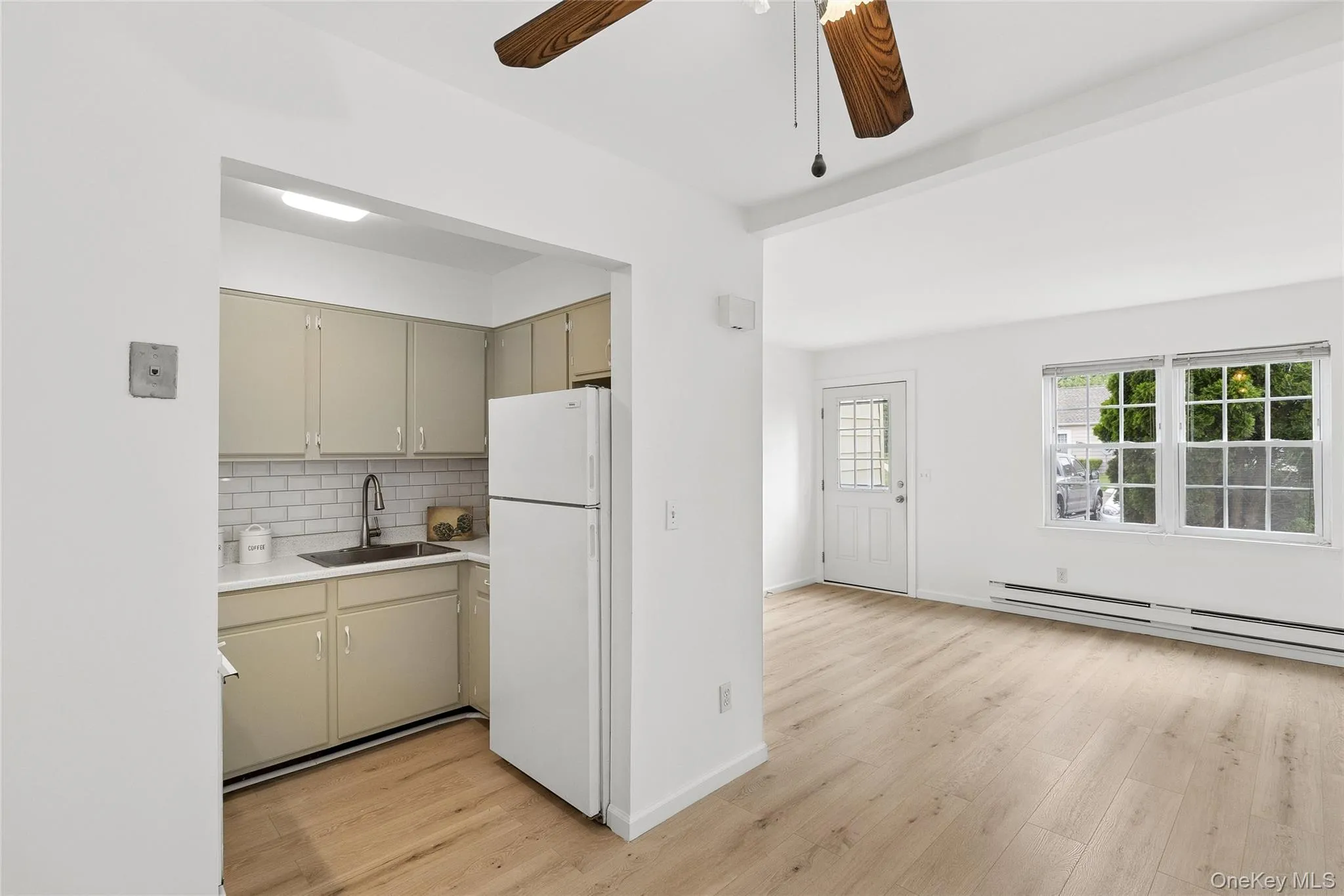 Dining area outside of kitchen, and open to living room Dining area outside of kitchen, and open to living room