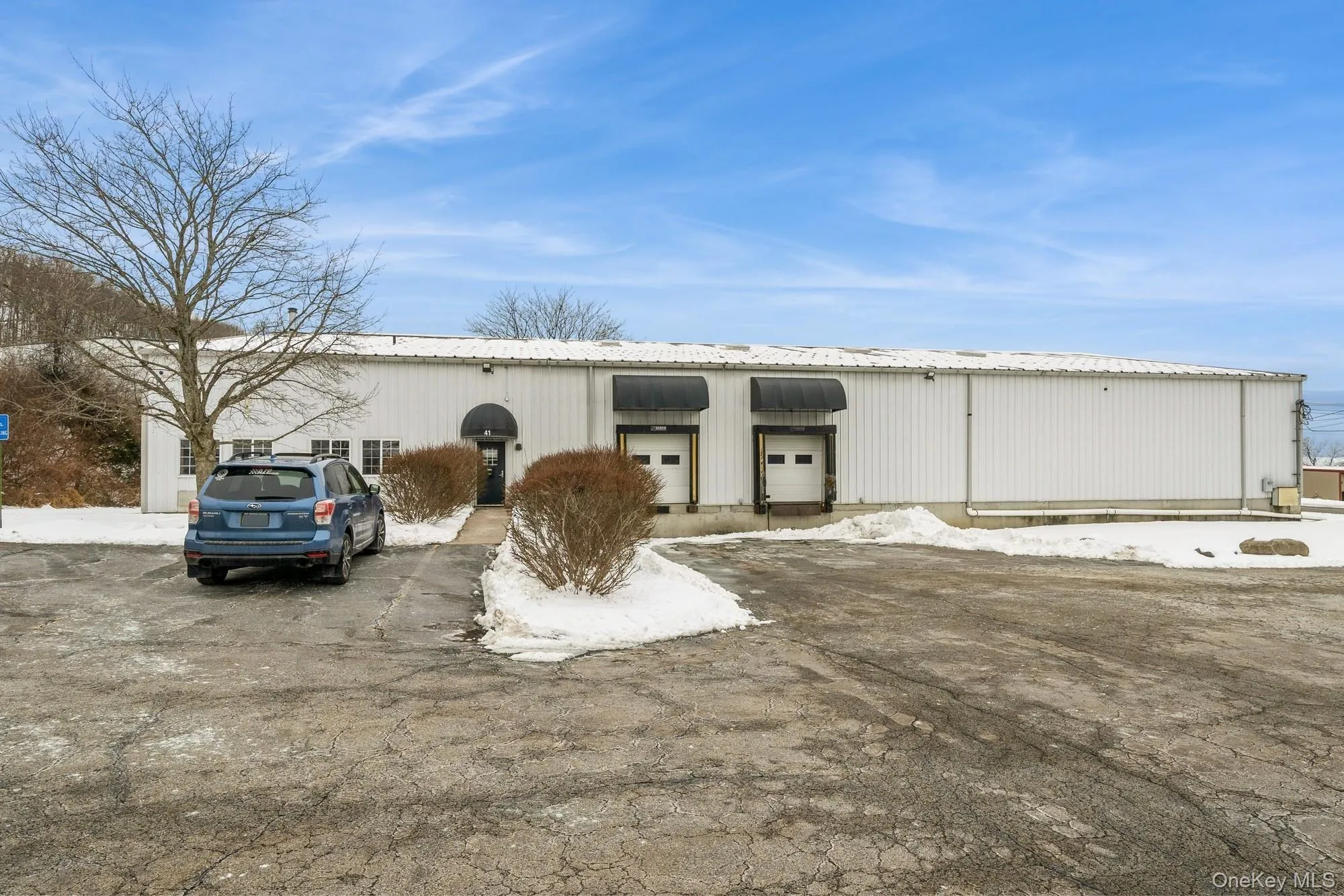 Front of Warehouse featuring two loading docks. Front of Warehouse featuring two loading docks.