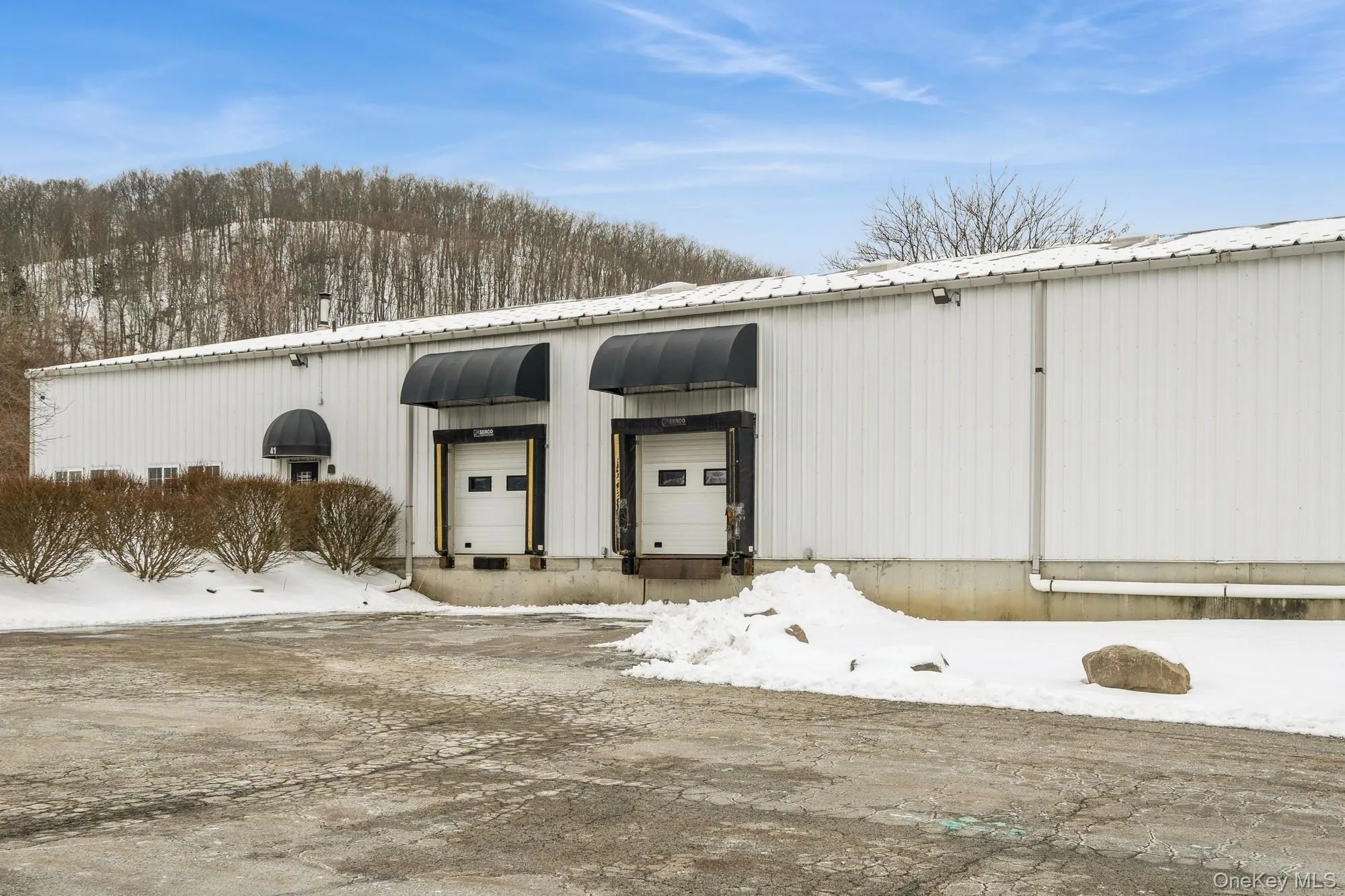 Front of Warehouse featuring two loading docks. Front of Warehouse featuring two loading docks.
