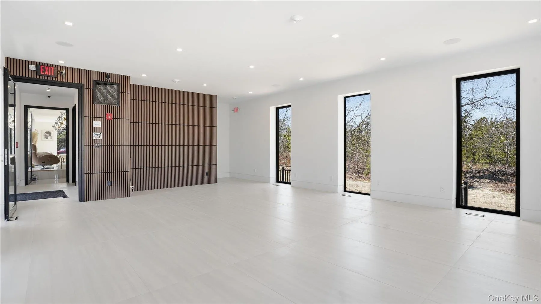 Unit - picture includes entrance and common hallway. Unit - picture includes entrance and common hallway.