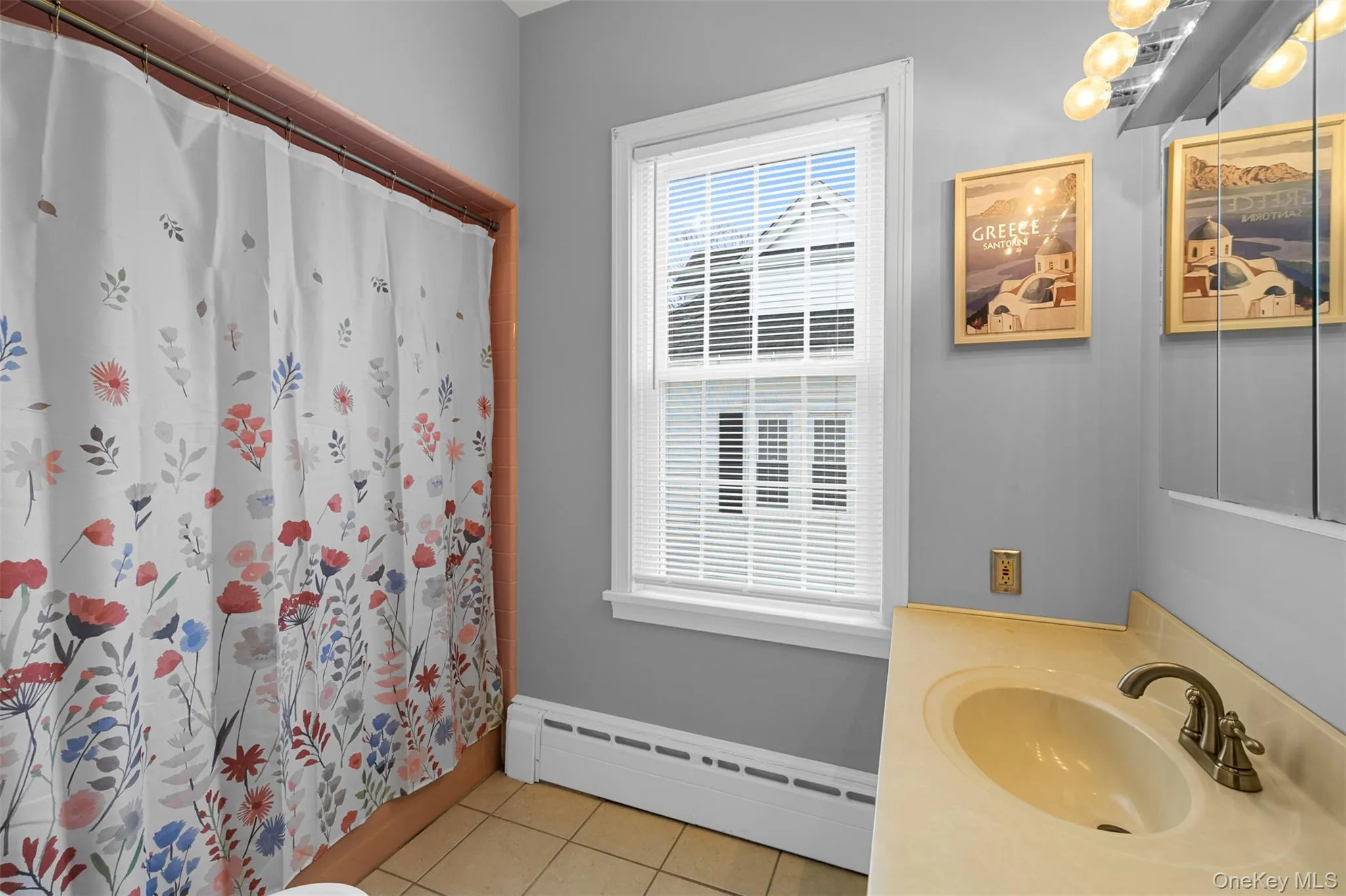 En-suite, full bath with tile floors En-suite, full bath with tile floors