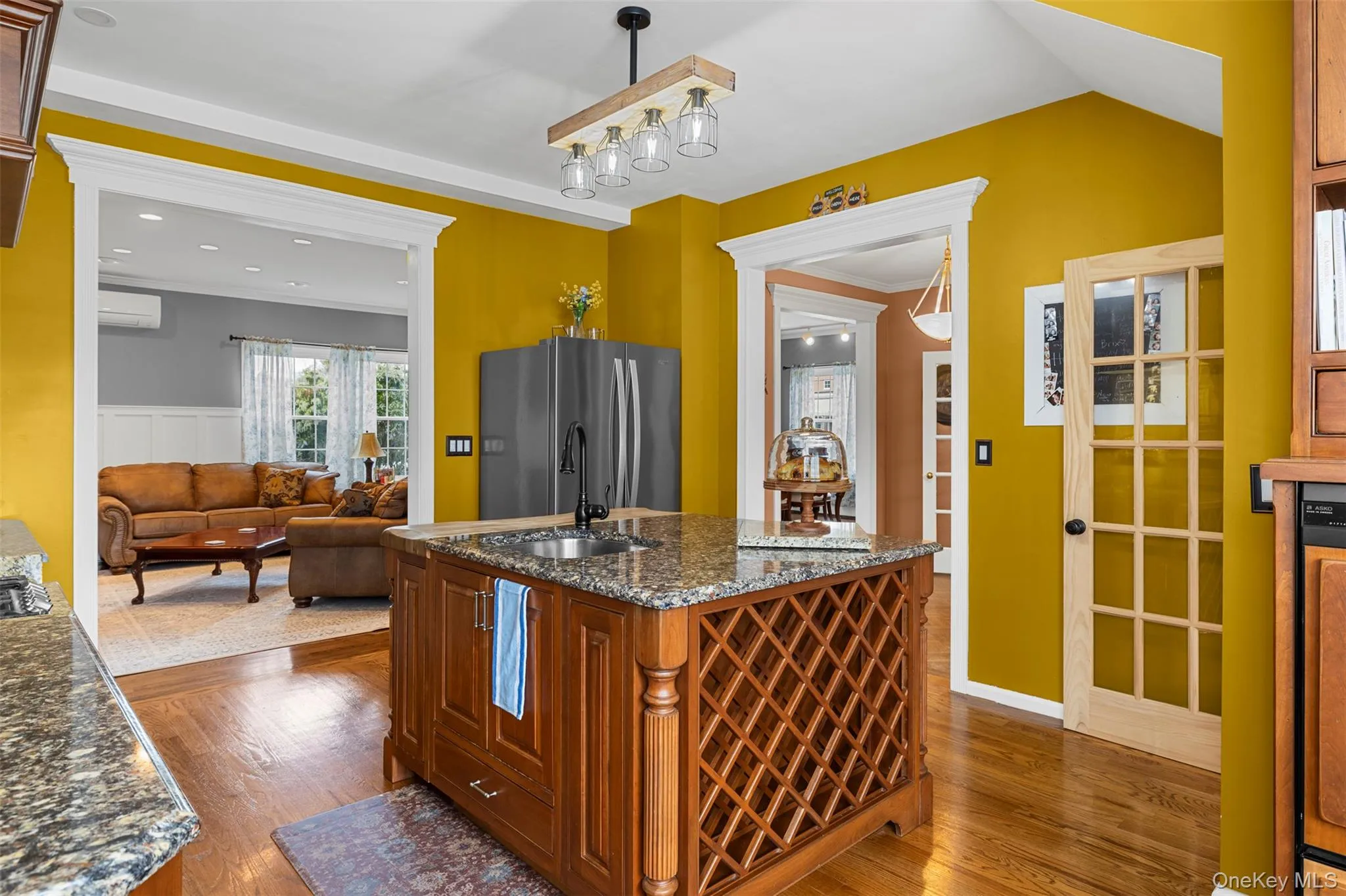 Kitchen with center island, eating nook, stainless steel appliances and pot filler Kitchen with center island, eating nook, stainless steel appliances and pot filler