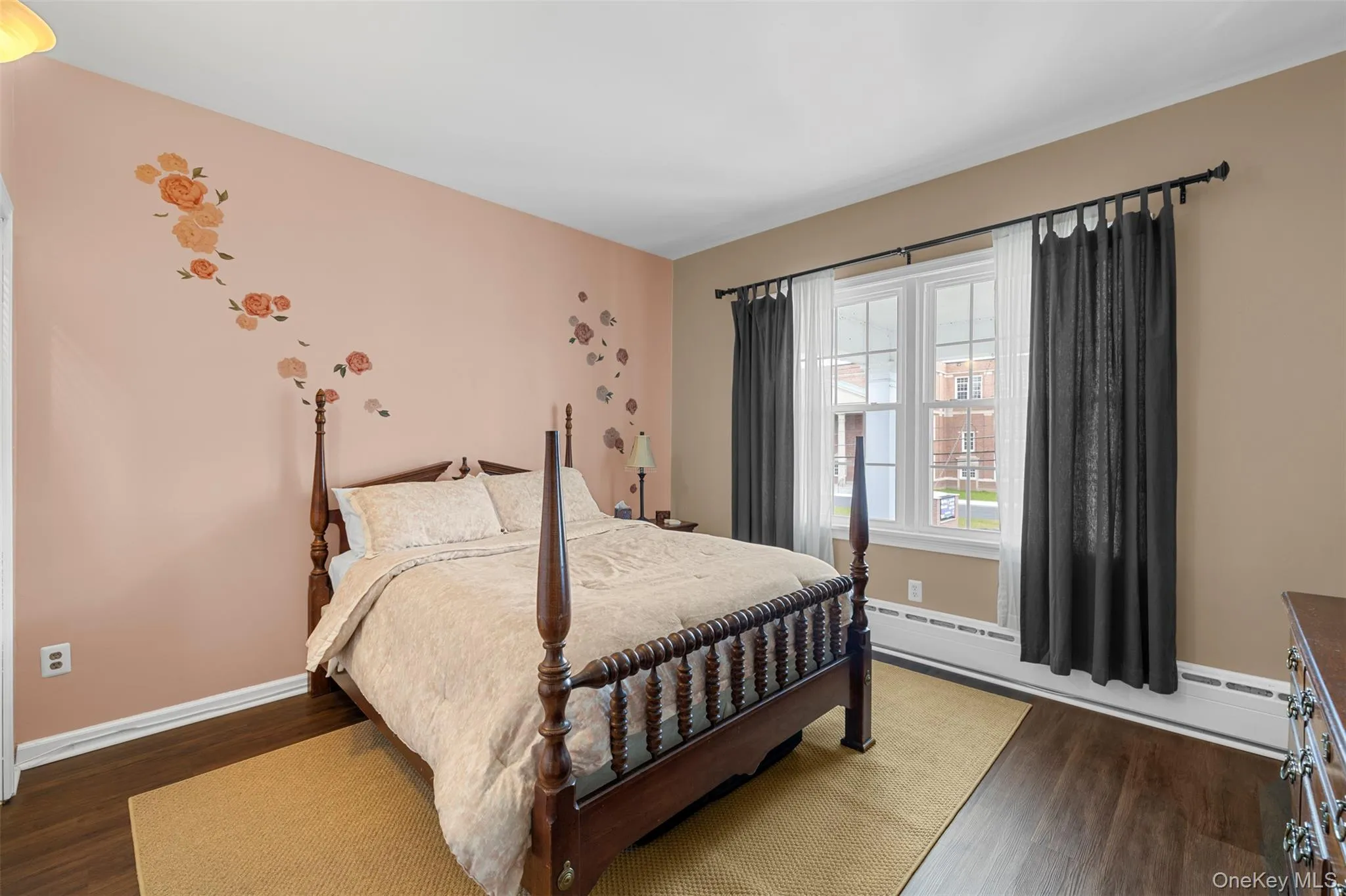 Bedroom featuring high ceilings Bedroom featuring high ceilings