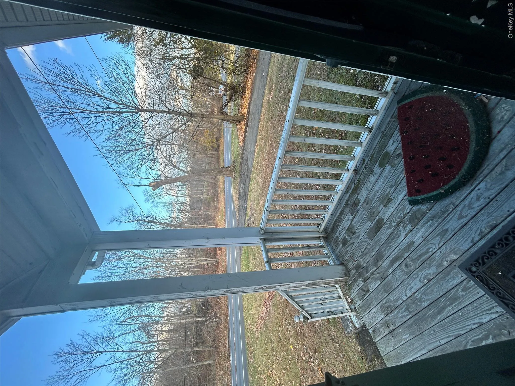 Wooden porch with a yard Wooden porch with a yard