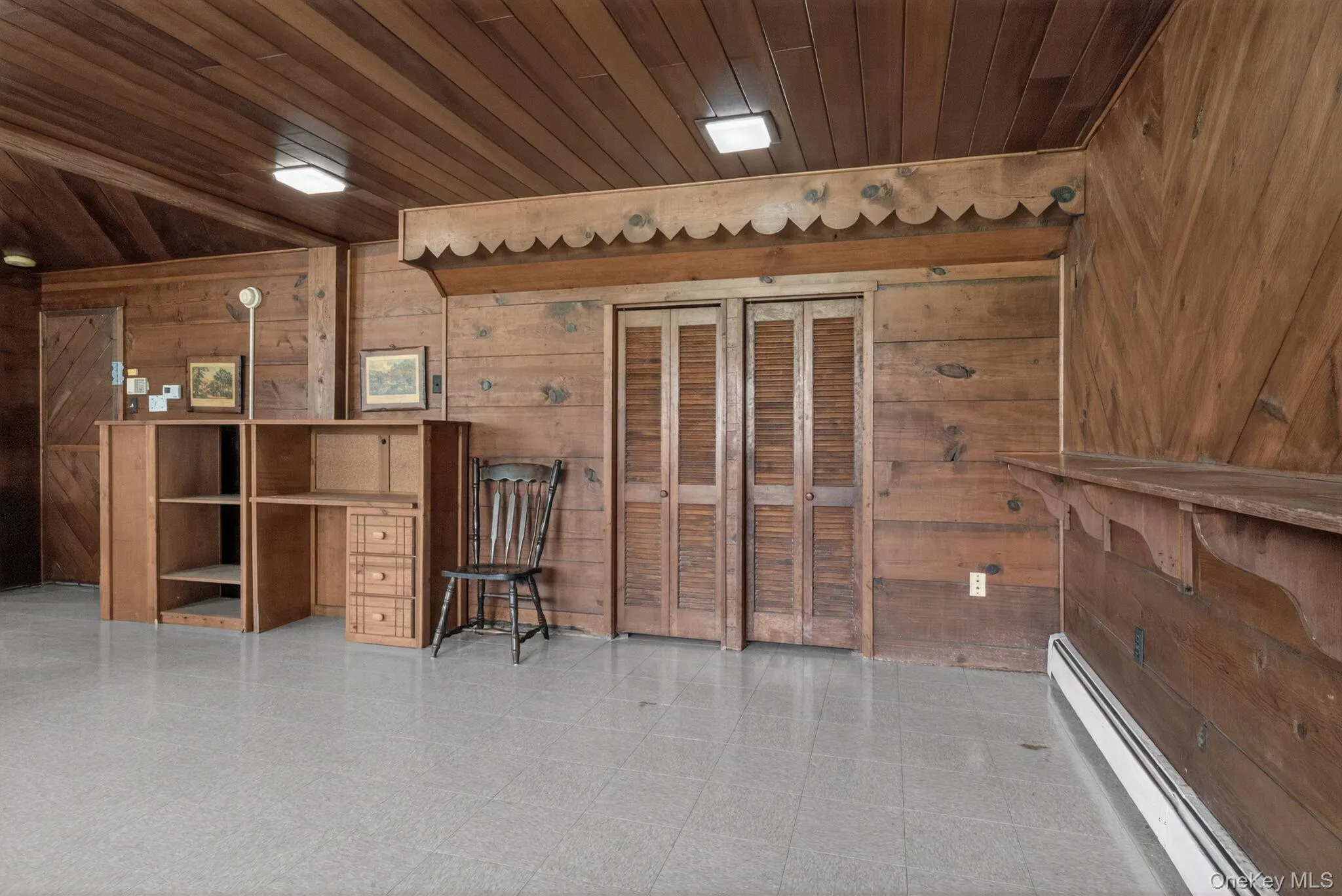 Open living room/bedroom area Open living room/bedroom area