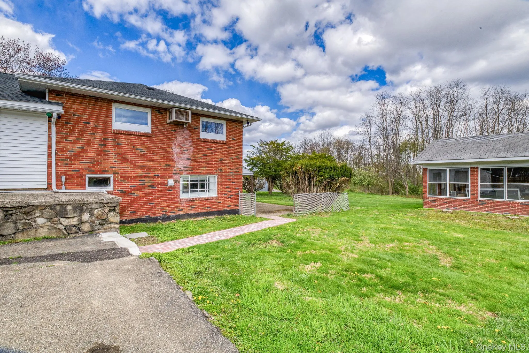 Walkway to unit front door and yard Walkway to unit front door and yard