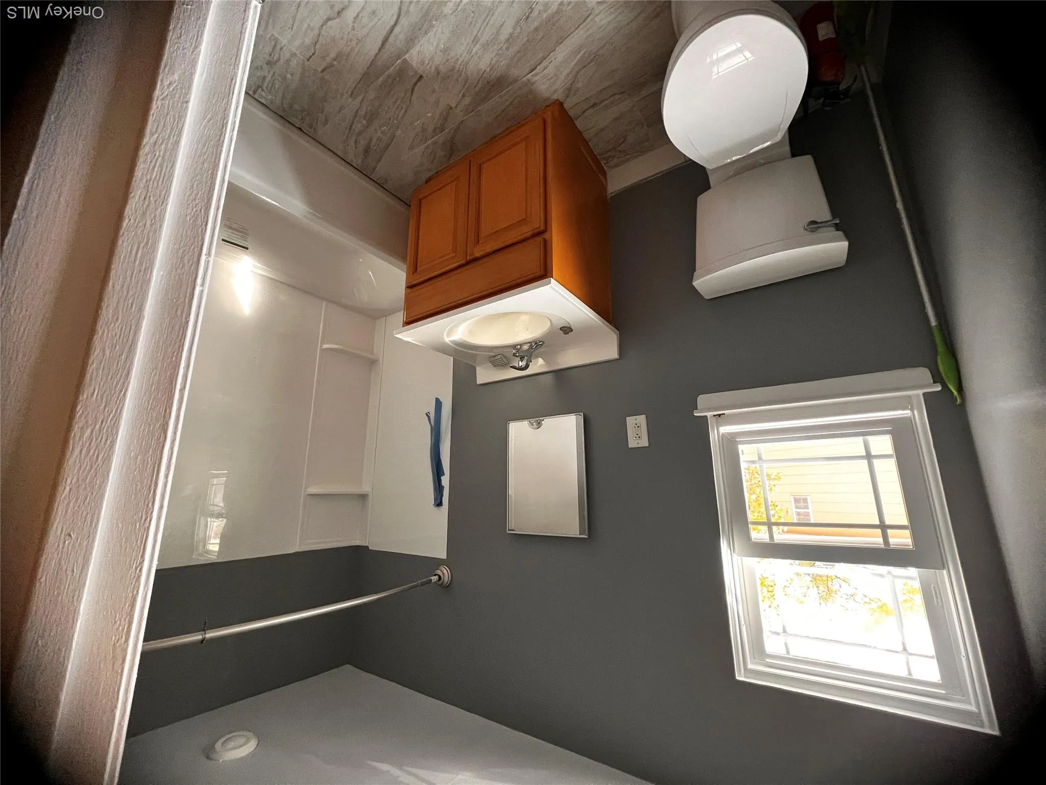 Bathroom featuring vanity and bathtub / shower combination Bathroom featuring vanity and bathtub / shower combination