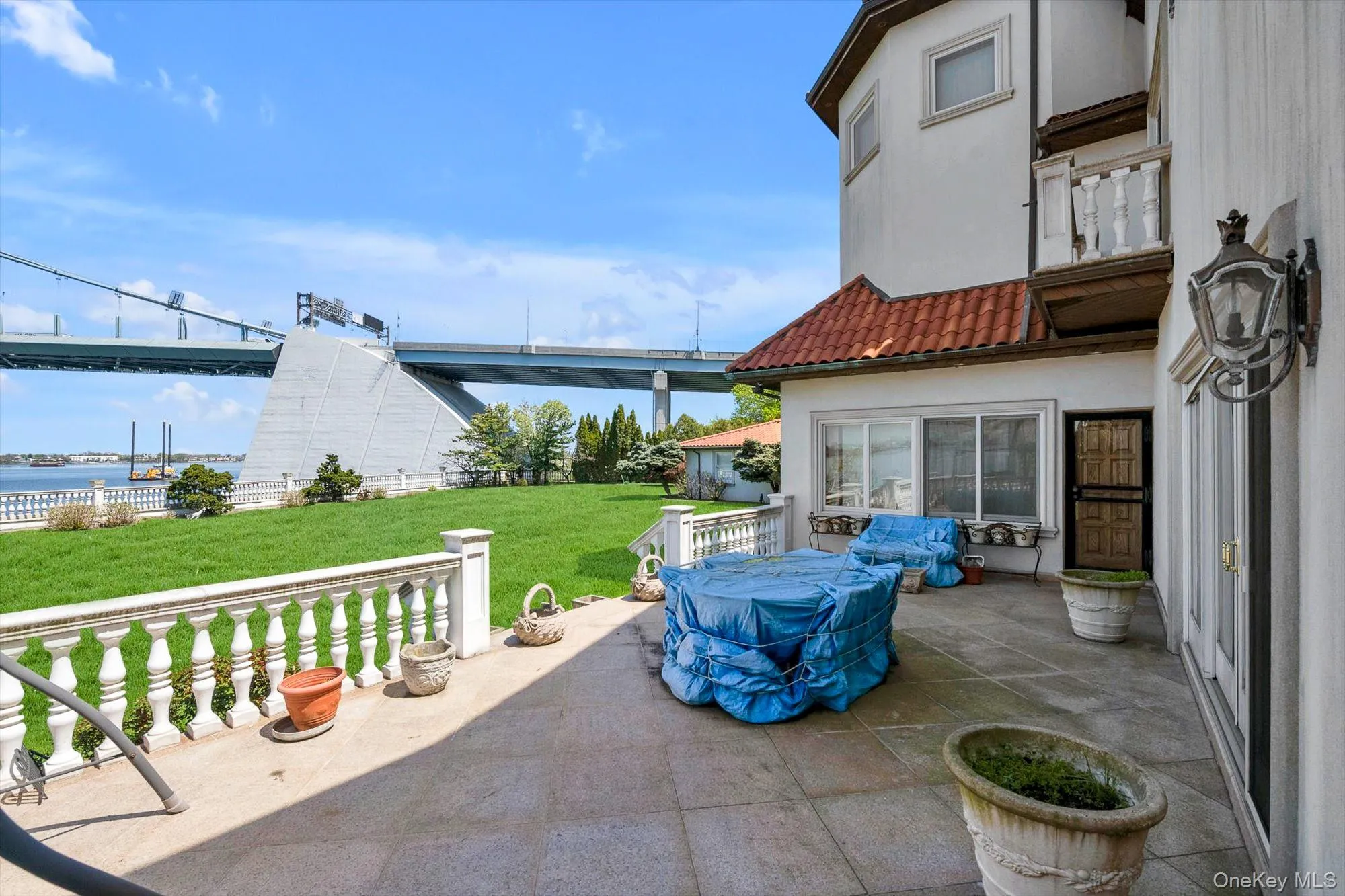 Backyard Patio with Sliding Doors to Dining Room and Kitchen entry Backyard Patio with Sliding Doors to Dining Room and Kitchen entry