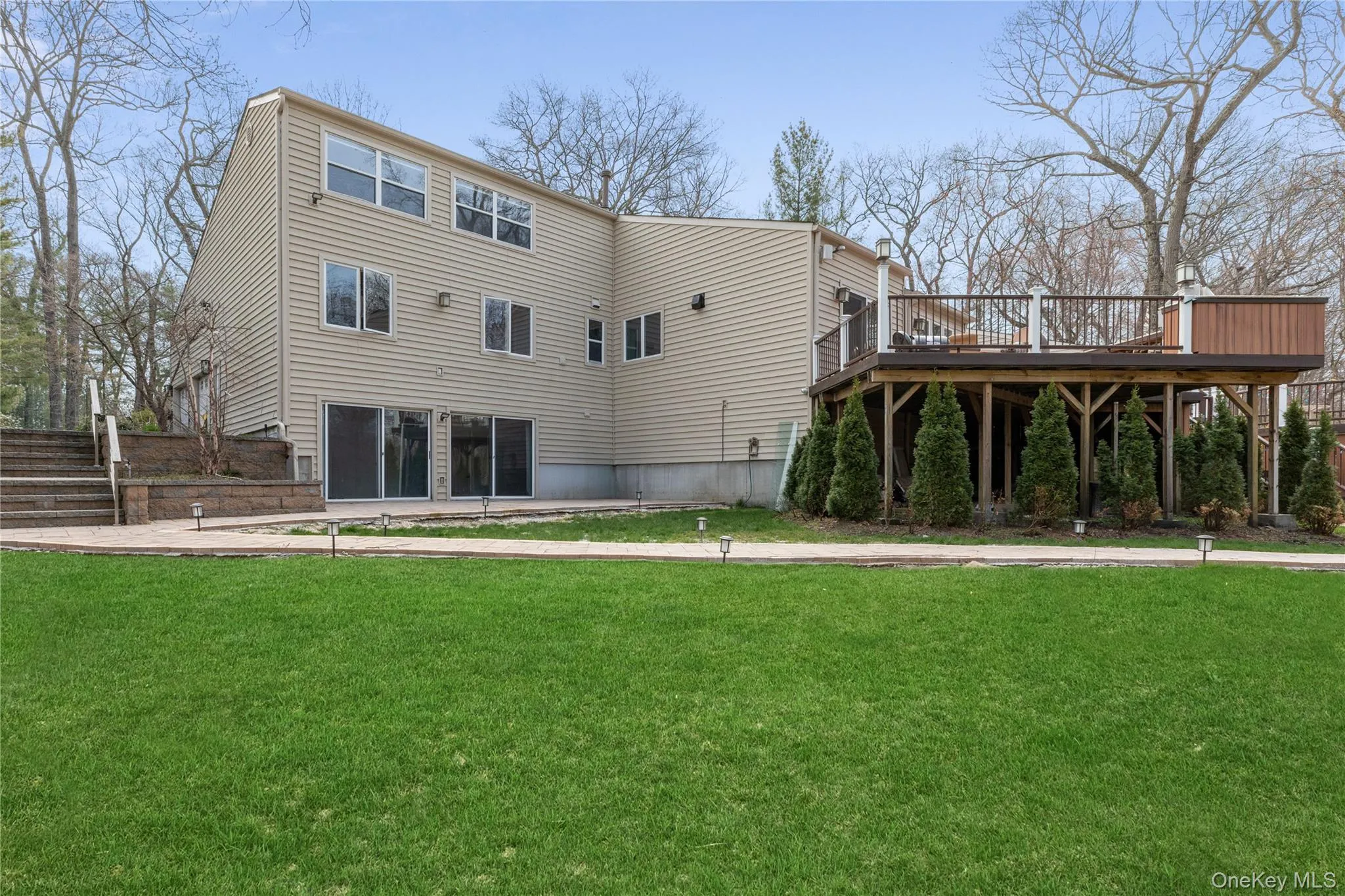 Expansive green lawn provides a broad outdoor space Expansive green lawn provides a broad outdoor space
