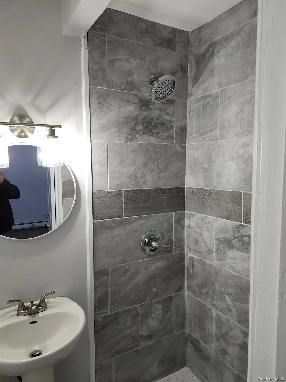 Custom Bathroom with sink and tiled shower Custom Bathroom with sink and tiled shower