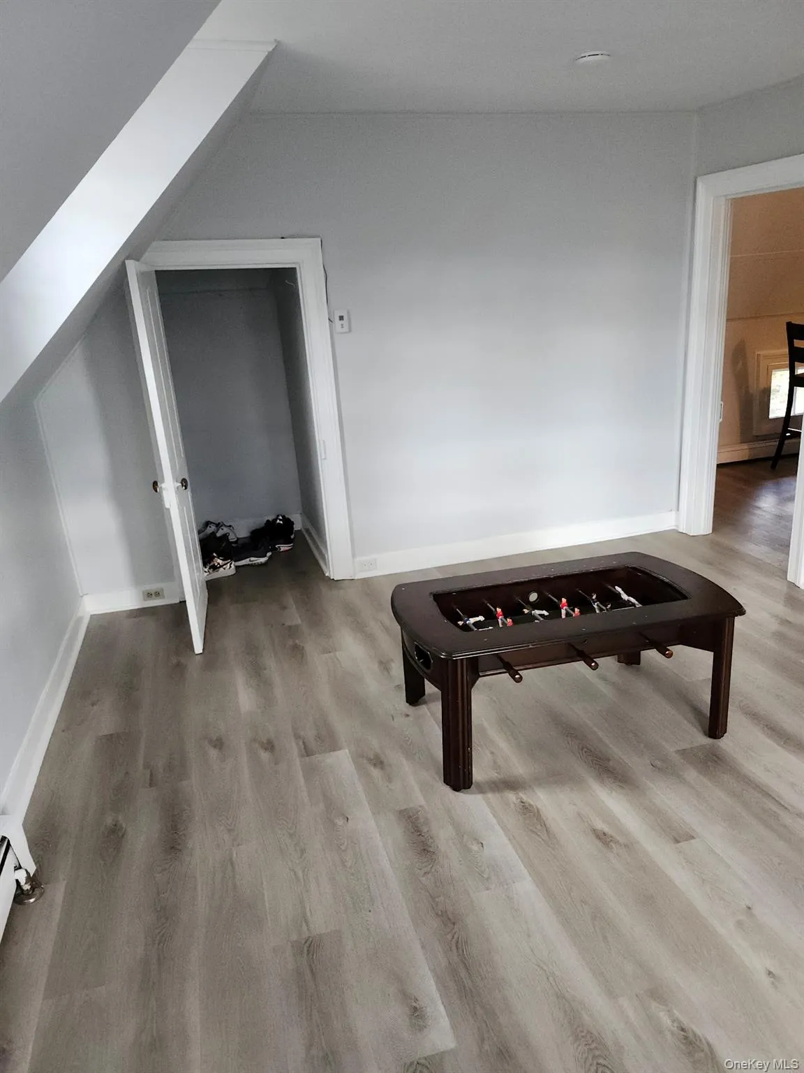 Game room featuring light hardwood / wood-style floors Game room featuring light hardwood / wood-style floors