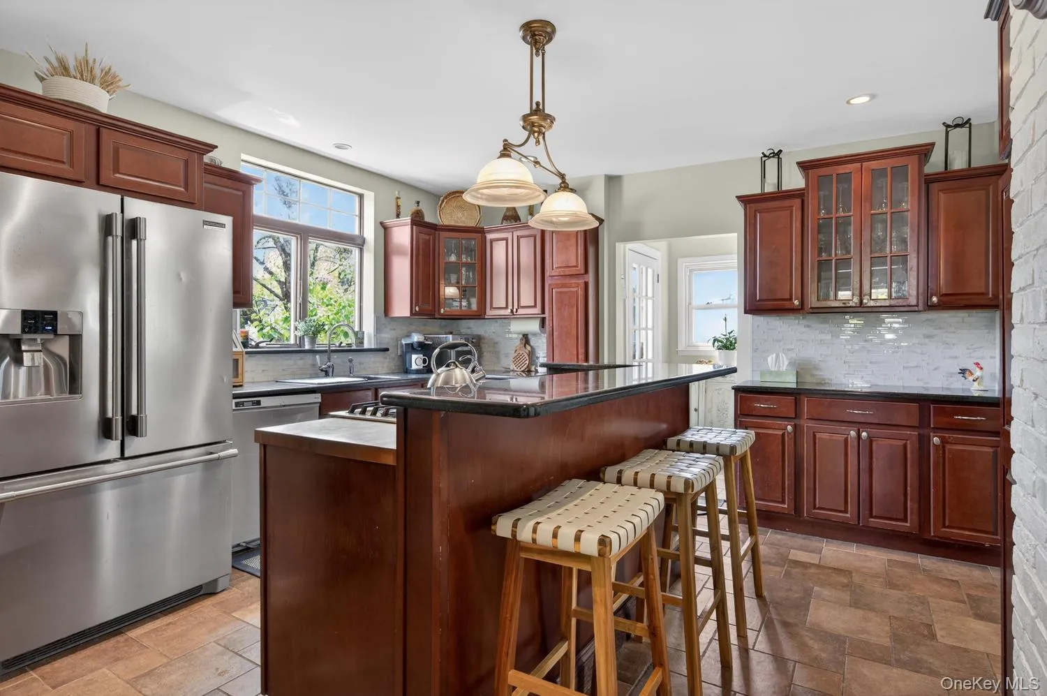 Eat In Kitchen with granite countertops and stainless steel appliances Eat In Kitchen with granite countertops and stainless steel appliances