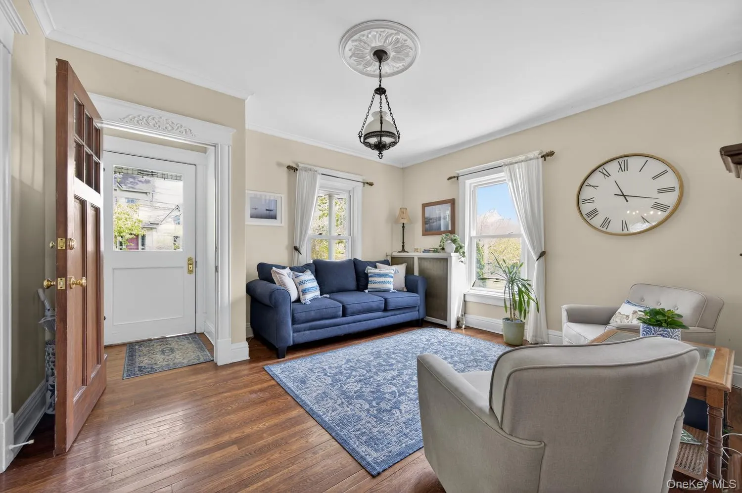 Living Room with original wood floors and high ceilings Living Room with original wood floors and high ceilings