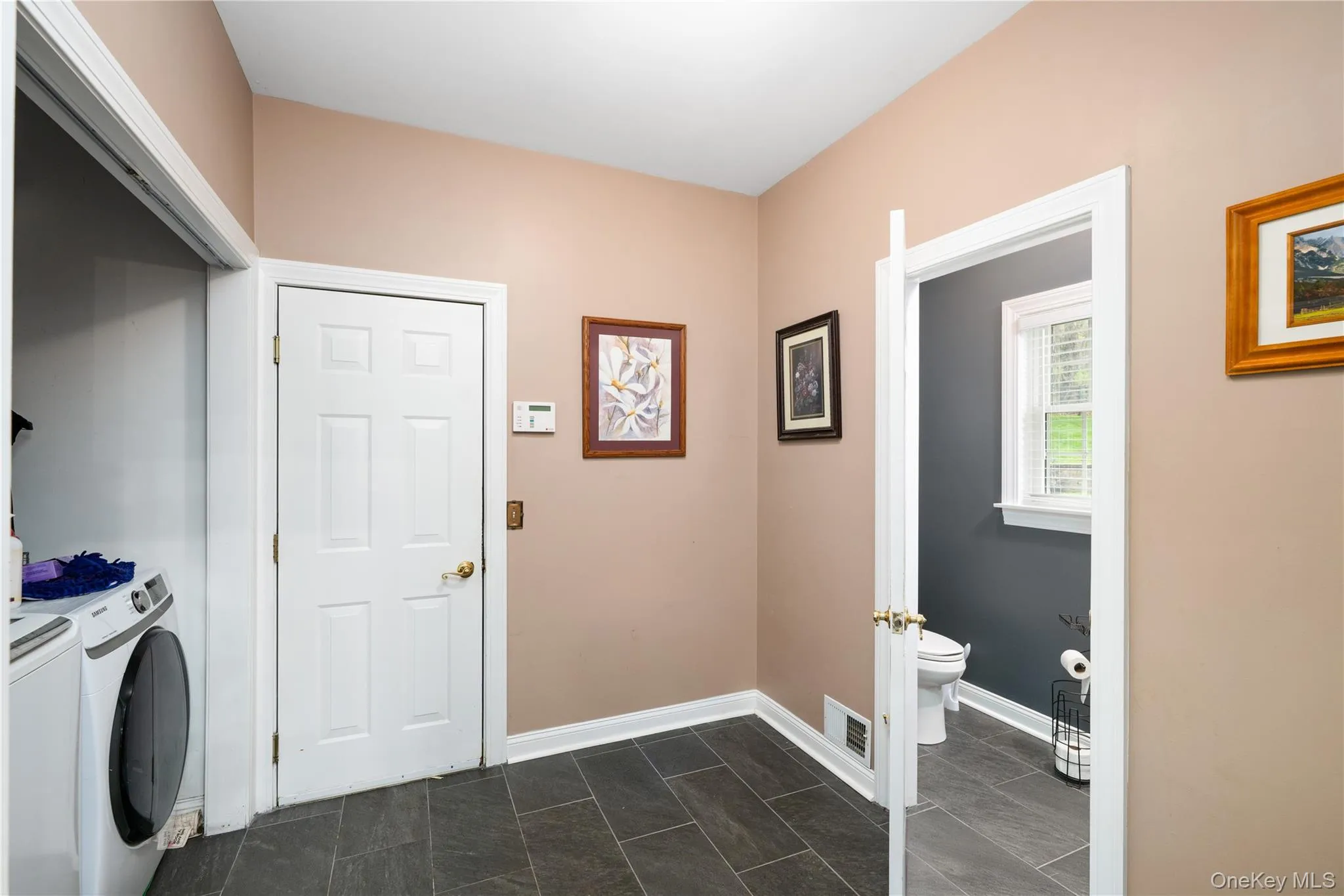 Mud Room w/ 1/2 BA, off of garage Mud Room w/ 1/2 BA, off of garage