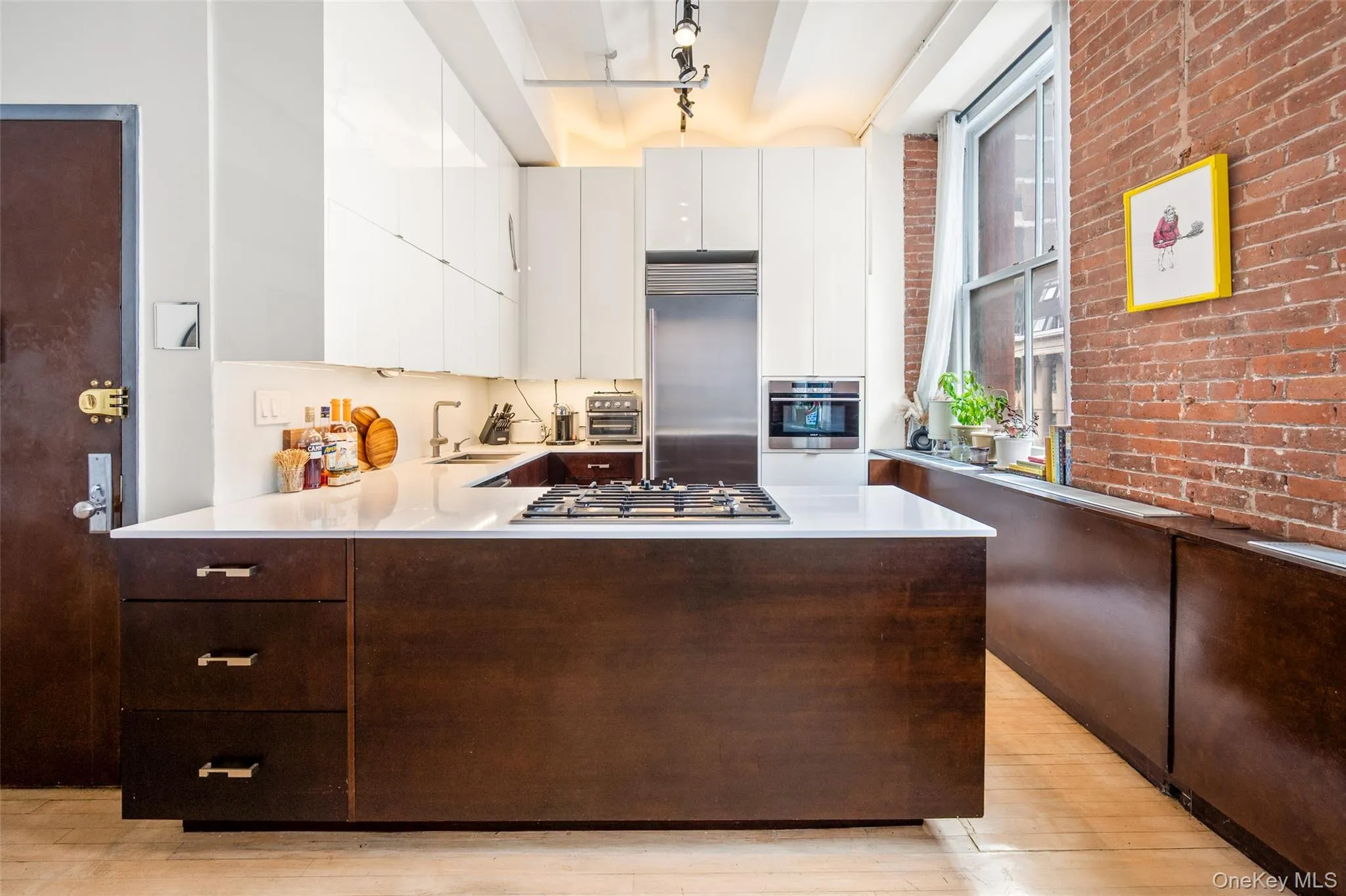 Sleek kitchen with custom cabinetry Sleek kitchen with custom cabinetry