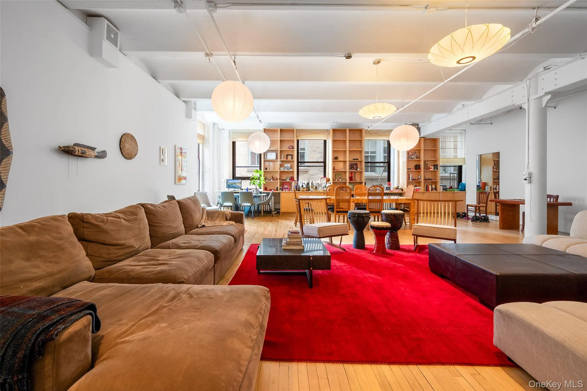 Expansive loft with custom shelving Expansive loft with custom shelving