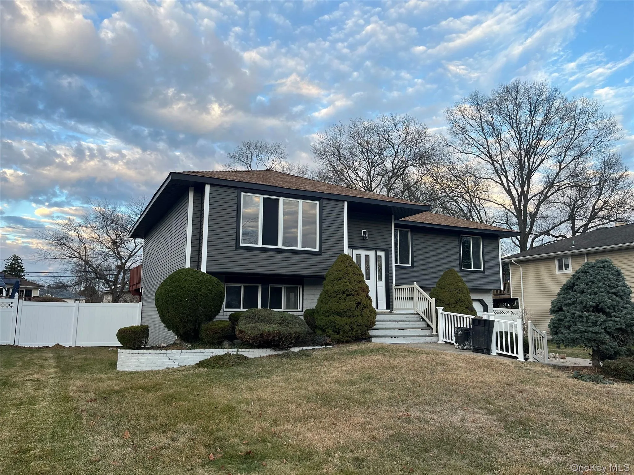 View of front of home featuring a front yard View of front of home featuring a front yard