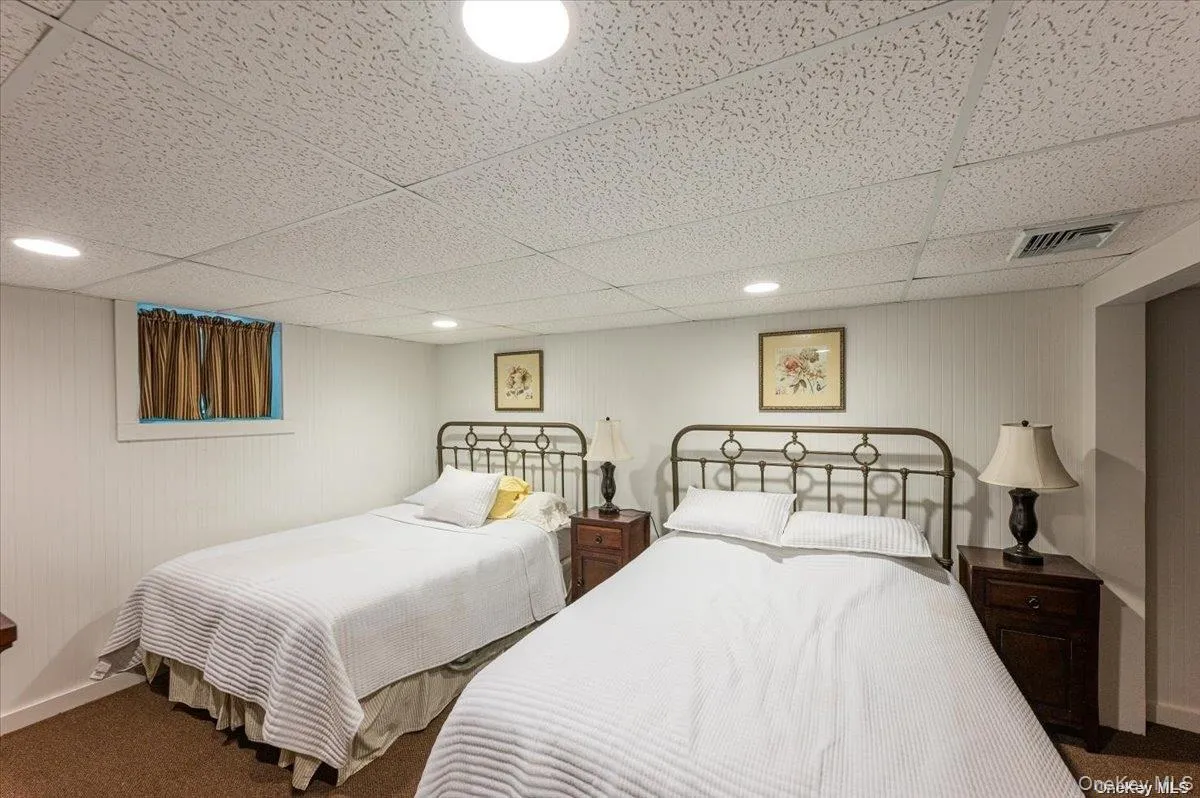 Finished room with recessed lighting and a drop ceiling Finished room with recessed lighting and a drop ceiling