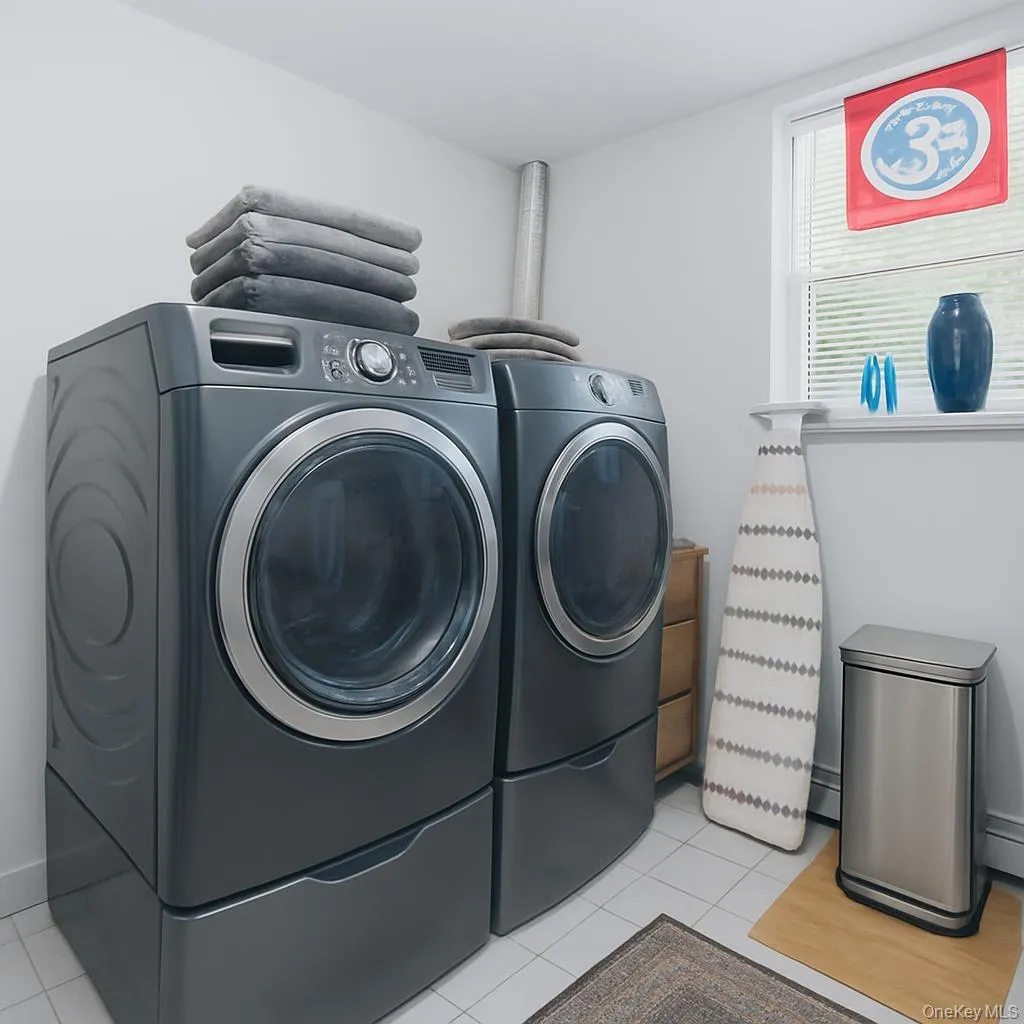 This oversized laundry room offers exceptional space and functionality, making everyday chores feel effortless. This oversized laundry room offers exceptional space and functionality, making everyday chores feel effortless.