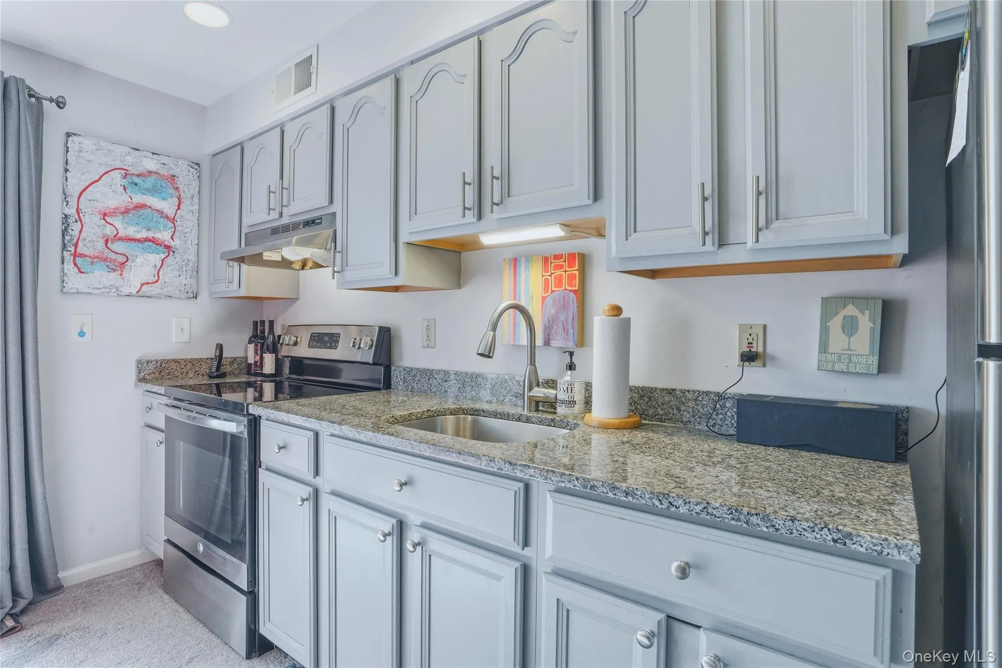 The second kitchen flows seamlessly into the living space, creating an easy, functional layout ideal for everyday living or extended family. With plenty of room for cooking, dining, and relaxing, the space is both practical and inviting. The second kitchen flows seamlessly into the living space, creating an easy, functional layout ideal for everyday living or extended family. With plenty of room for cooking, dining, and relaxing, the space is both practical and inviting.