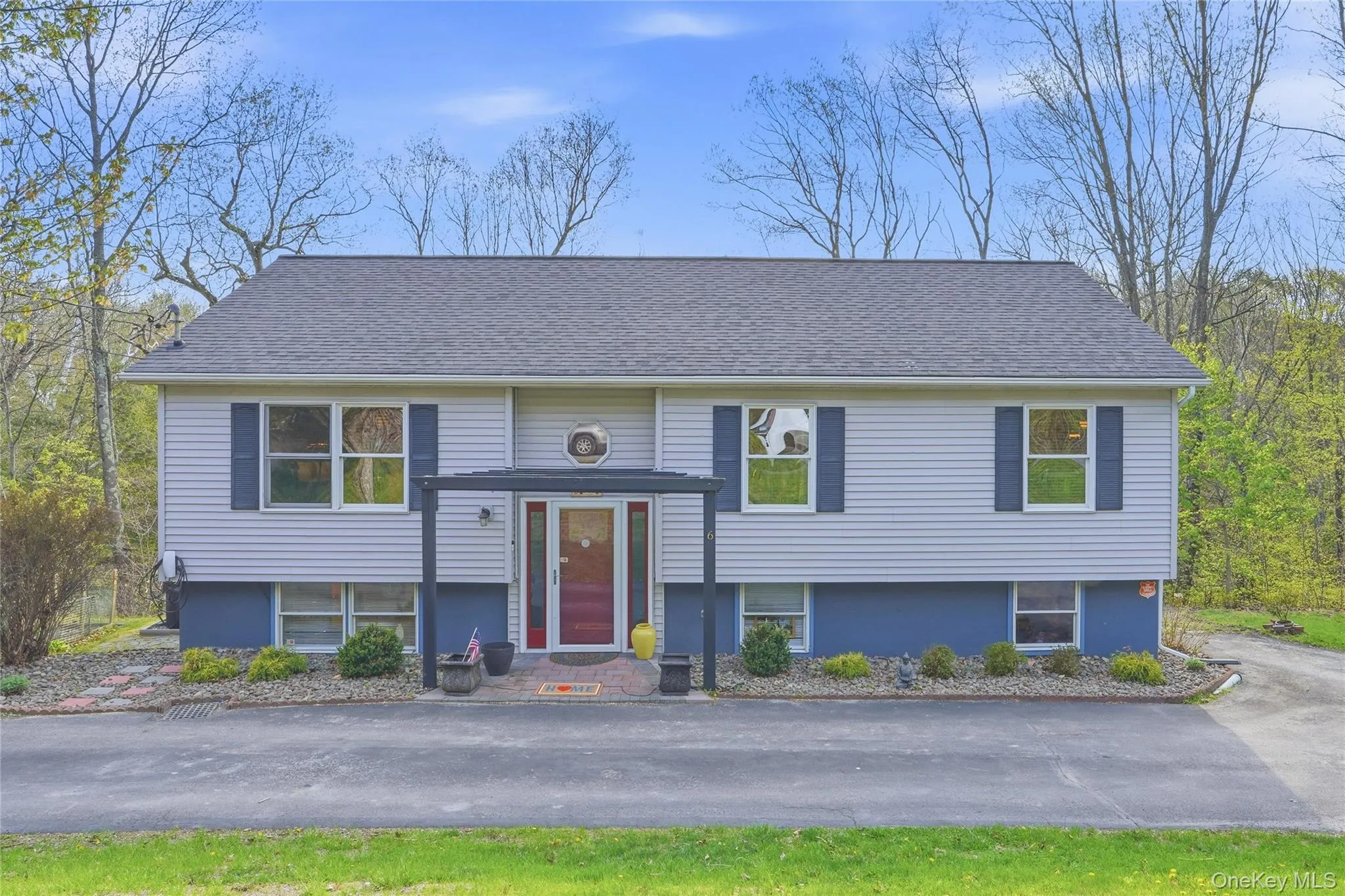 The exterior of this mother-daughter home is both inviting and functional, designed to complement its versatile layout. Set on a spacious lot, the home features a well-maintained façade with attractive siding, mature landscaping, and a welcoming front entrance. The exterior of this mother-daughter home is both inviting and functional, designed to complement its versatile layout. Set on a spacious lot, the home features a well-maintained façade with attractive siding, mature landscaping, and a welcoming front entrance.