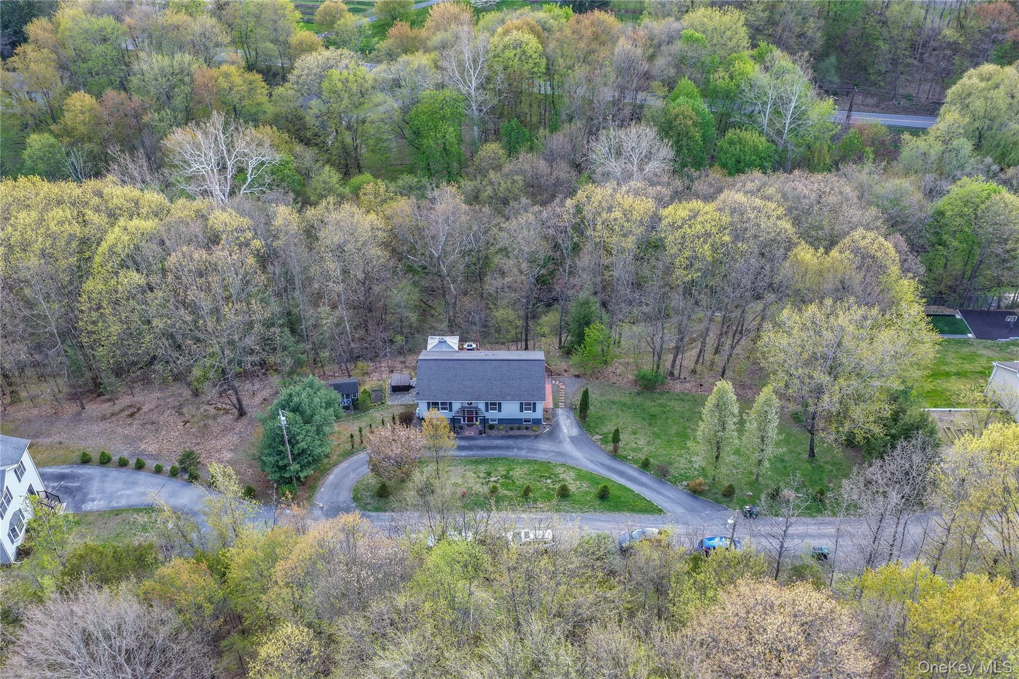 Nestled on a full acre at the end of a private dead-end road, this beautiful, raised ranch offers the perfect blend of privacy and peaceful living Nestled on a full acre at the end of a private dead-end road, this beautiful, raised ranch offers the perfect blend of privacy and peaceful living
