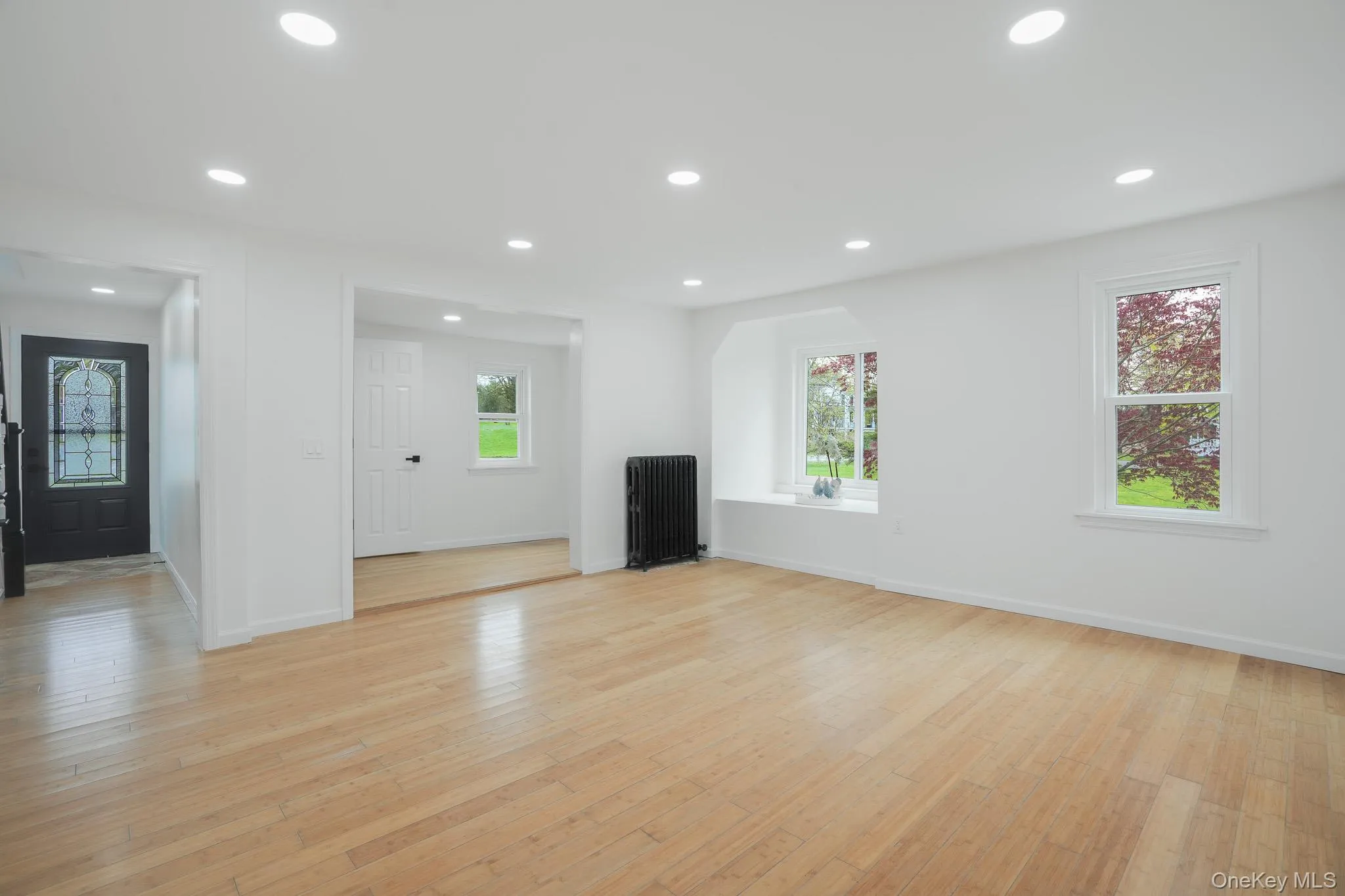 Spacious living room, that blends into a office/den area and half bathroom. Spacious living room, that blends into a office/den area and half bathroom.
