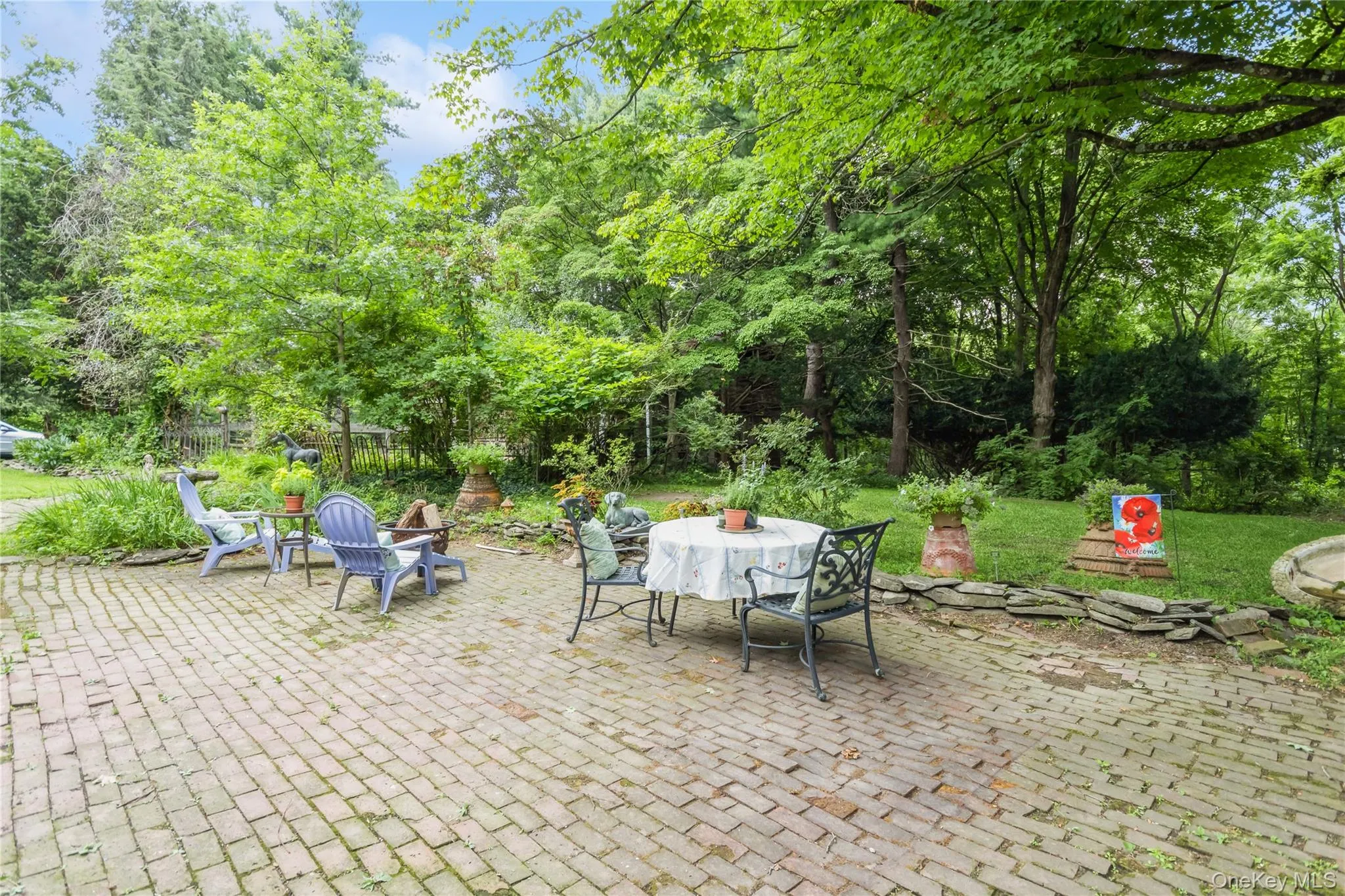 View of patio featuring outdoor dining space View of patio featuring outdoor dining space