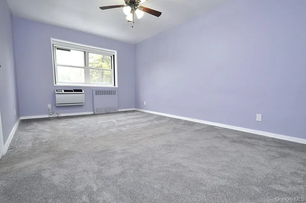 The large main bedroom is almost as large as the living room and has a wall of closets and covered refinished hardwood floors. The bedroom can easily accommodate a king size bed, dresser, night stands and reading chair. The bedroom is 16'-8" x 10'-7". The large main bedroom is almost as large as the living room and has a wall of closets and covered refinished hardwood floors. The bedroom can easily accommodate a king size bed, dresser, night stands and reading chair. The bedroom is 16'-8" x 10'-7".