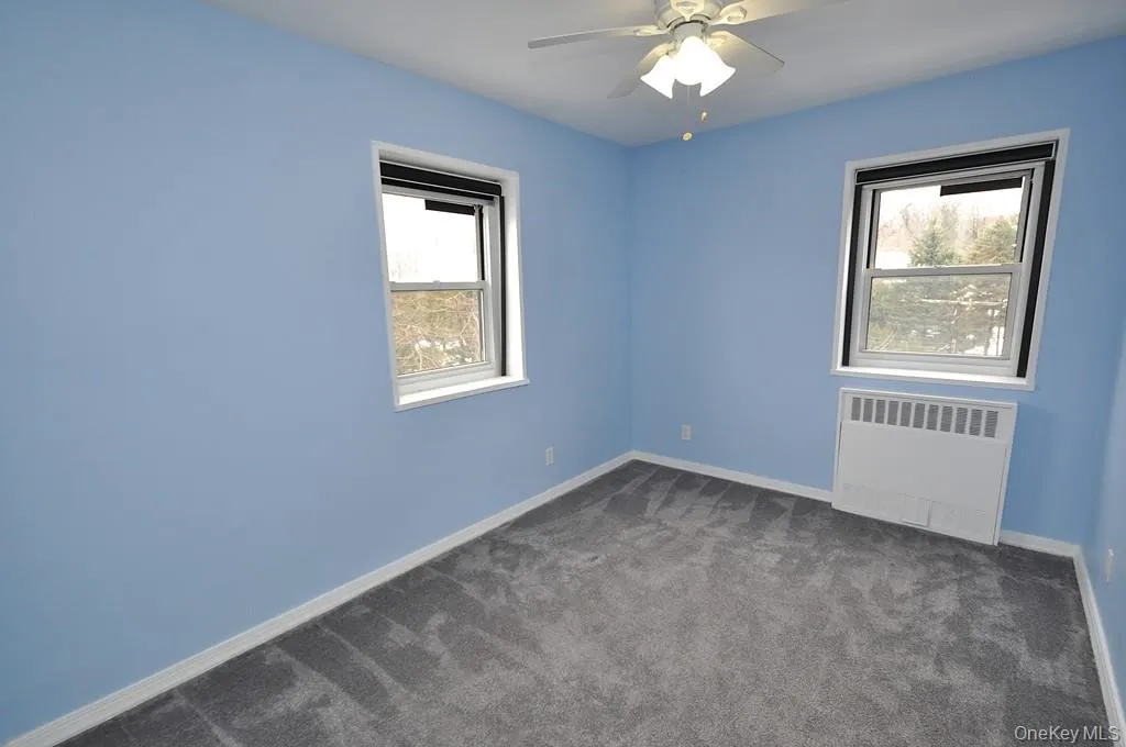 The corner second bedroom has covered hardwood floors. and can be used as a home office, den or guest room. The room is approx 11'-10' x 8'-9". The corner second bedroom has covered hardwood floors. and can be used as a home office, den or guest room. The room is approx 11'-10' x 8'-9".