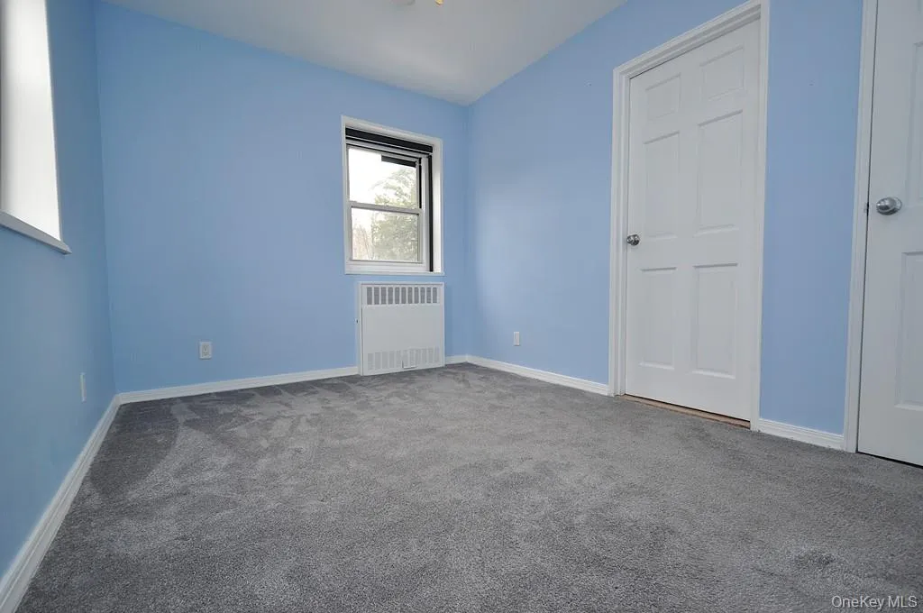 The corner second bedroom has covered hardwood floors. and can be used as a home office, den or guest room. The room is approx 11'-10' x 8'-9". The corner second bedroom has covered hardwood floors. and can be used as a home office, den or guest room. The room is approx 11'-10' x 8'-9".