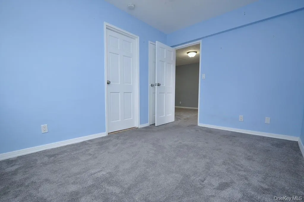 The corner second bedroom has covered hardwood floors. and can be used as a home office, den or guest room. The room is approx 11'-10' x 8'-9". The corner second bedroom has covered hardwood floors. and can be used as a home office, den or guest room. The room is approx 11'-10' x 8'-9".